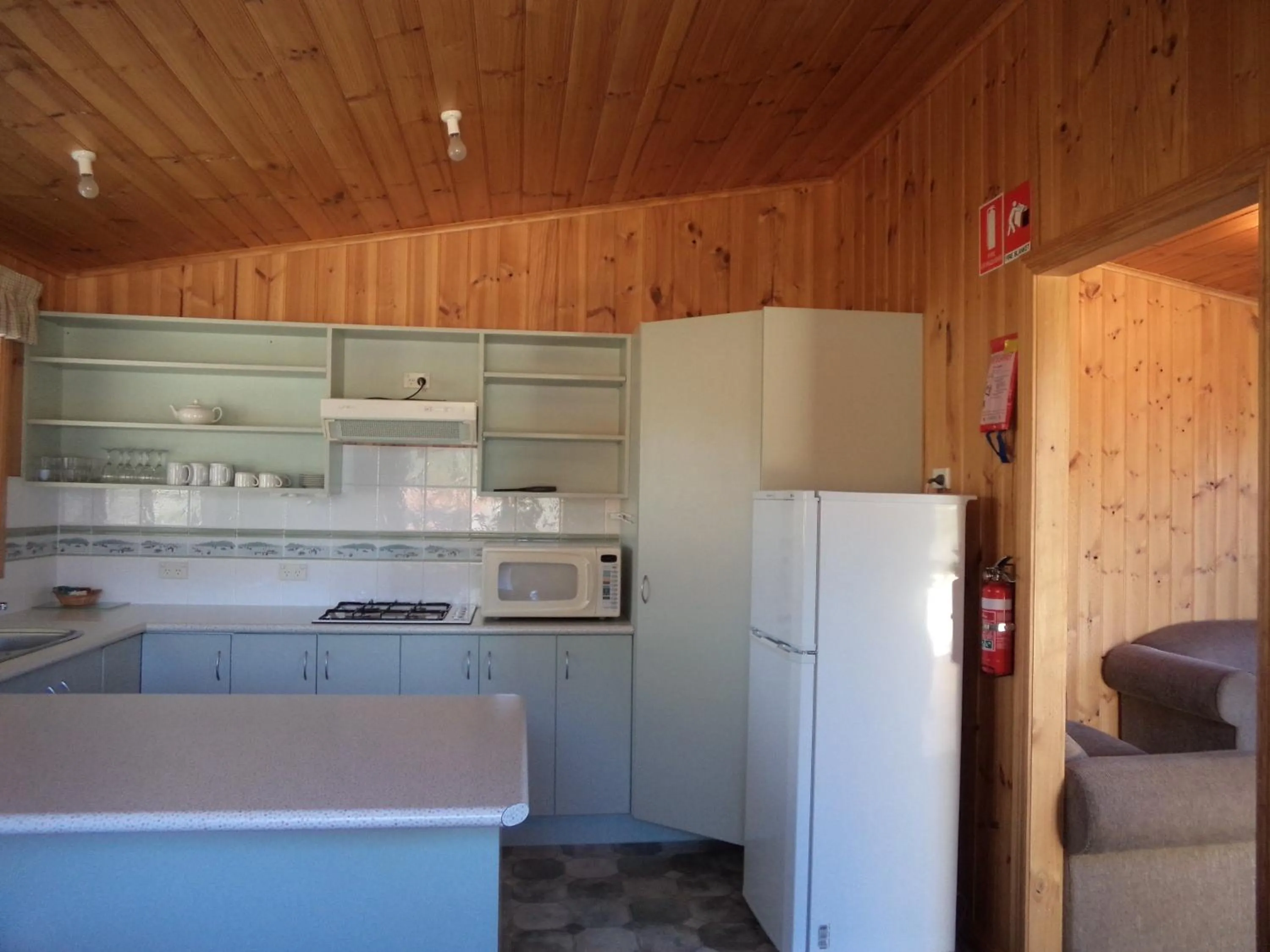 Kitchen or kitchenette in Bicheno East Coast Holiday Park