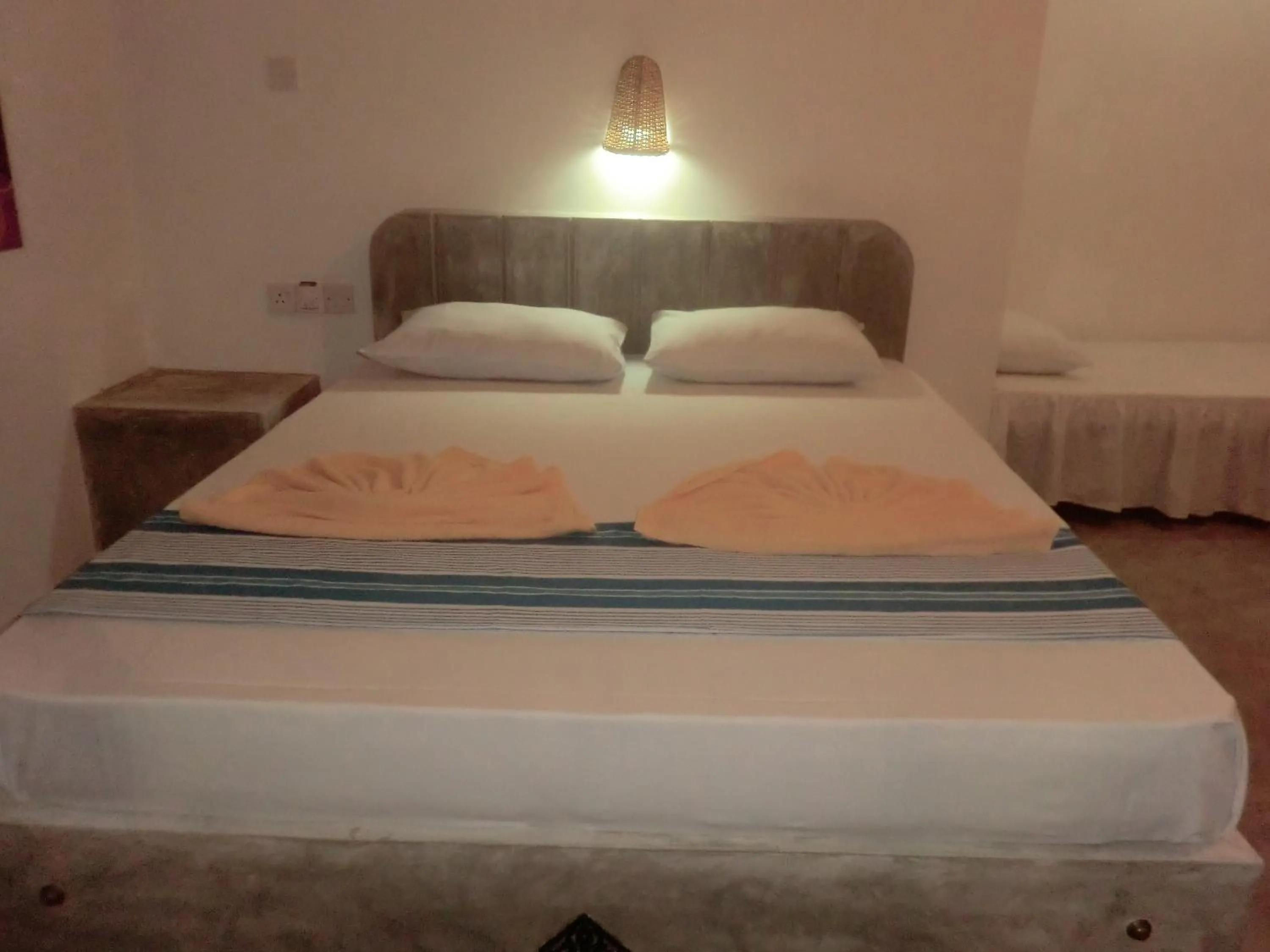 Bed in Peacock Wings Guest