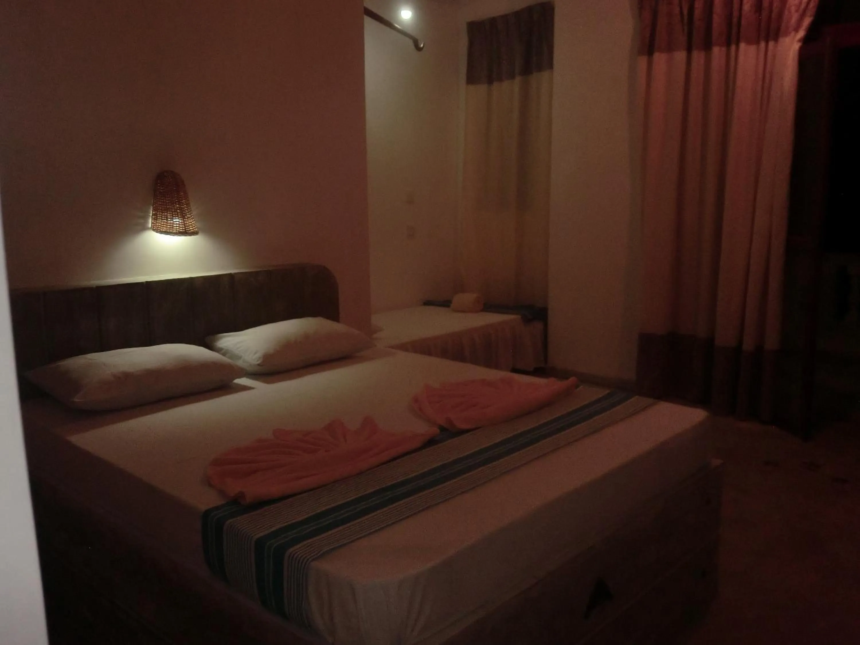 Bed in Peacock Wings Guest