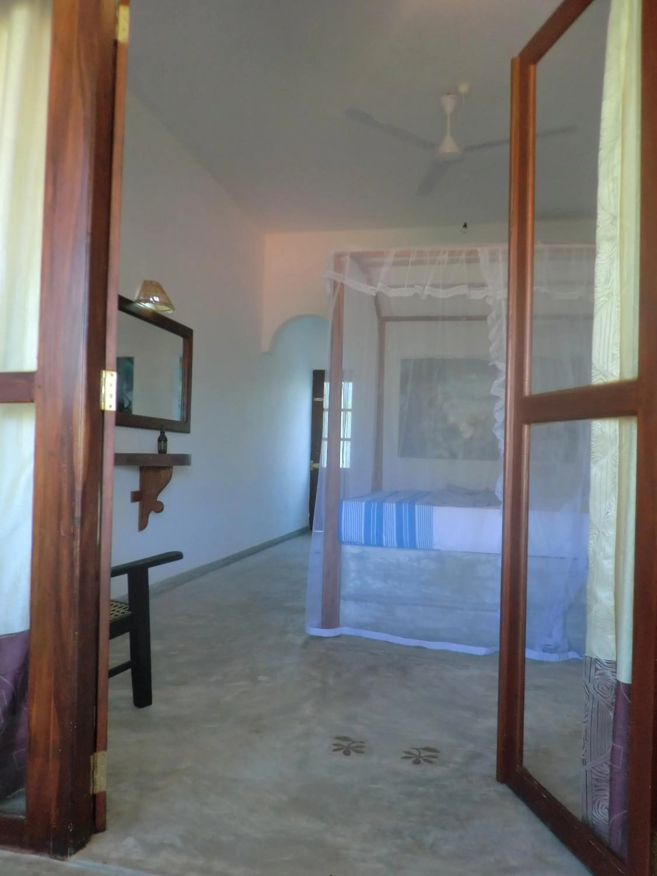 Bed in Peacock Wings Guest