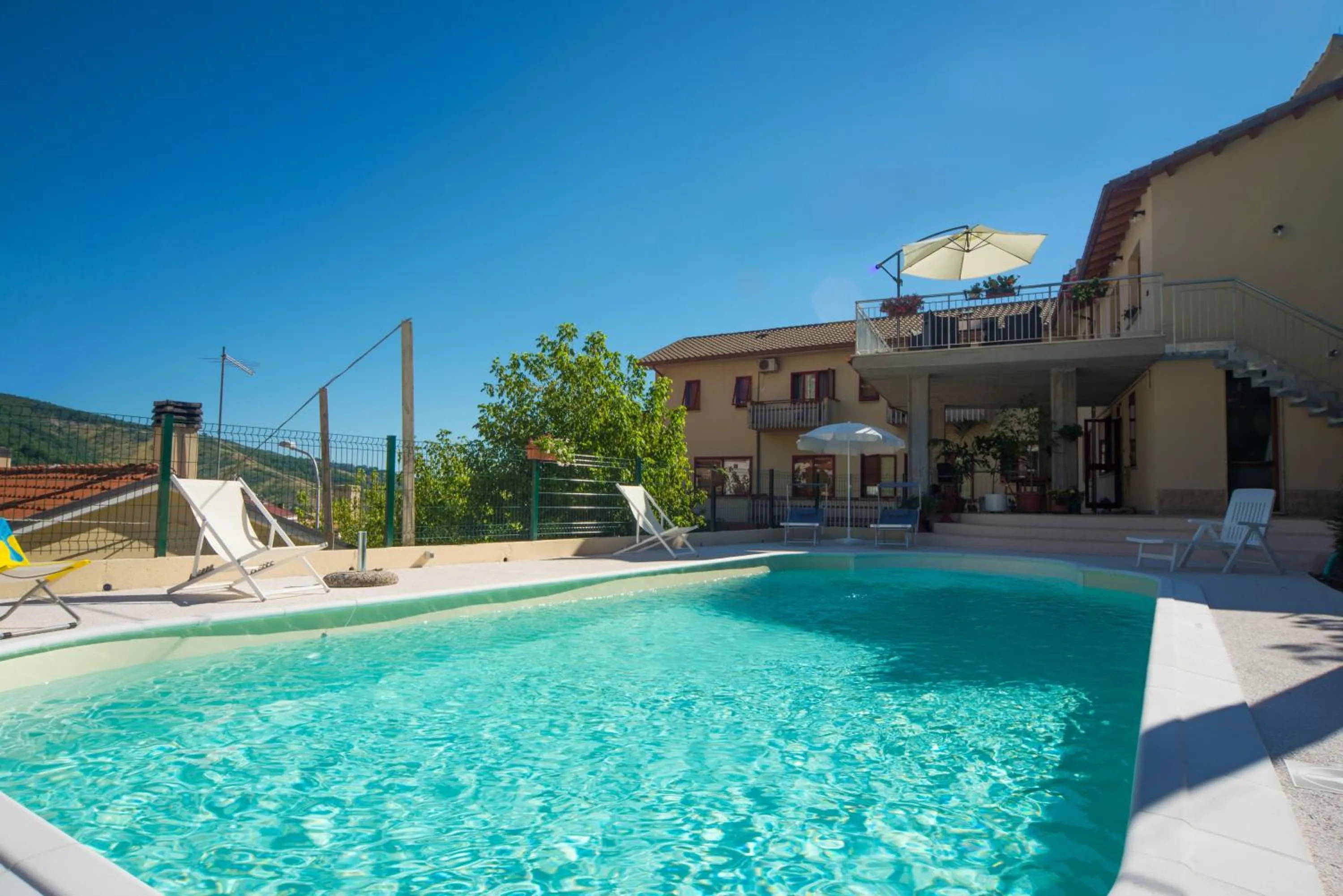 Swimming pool in Residence La Piazzetta
