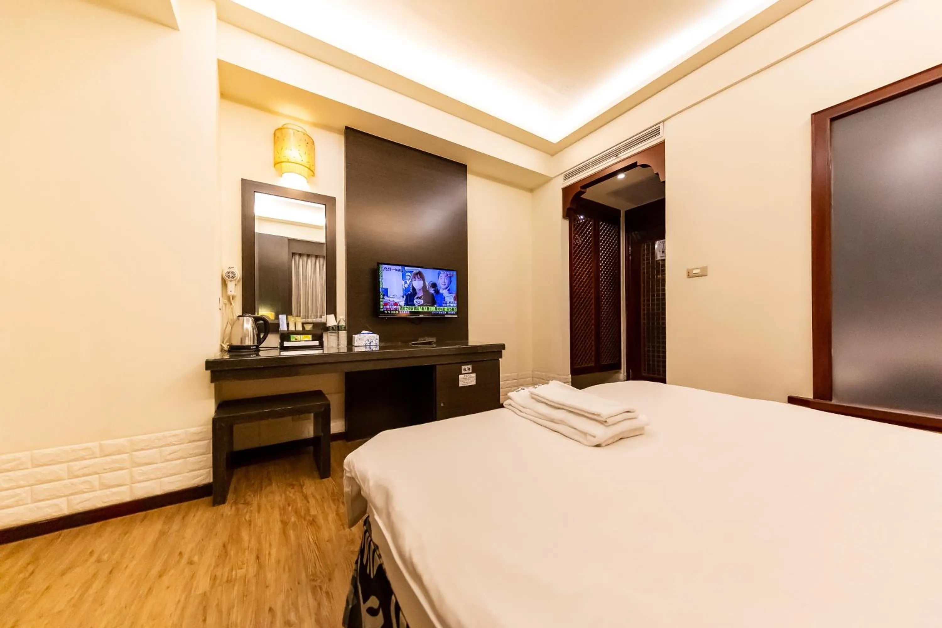 Bed in I HI Sanduo Travel Hotel