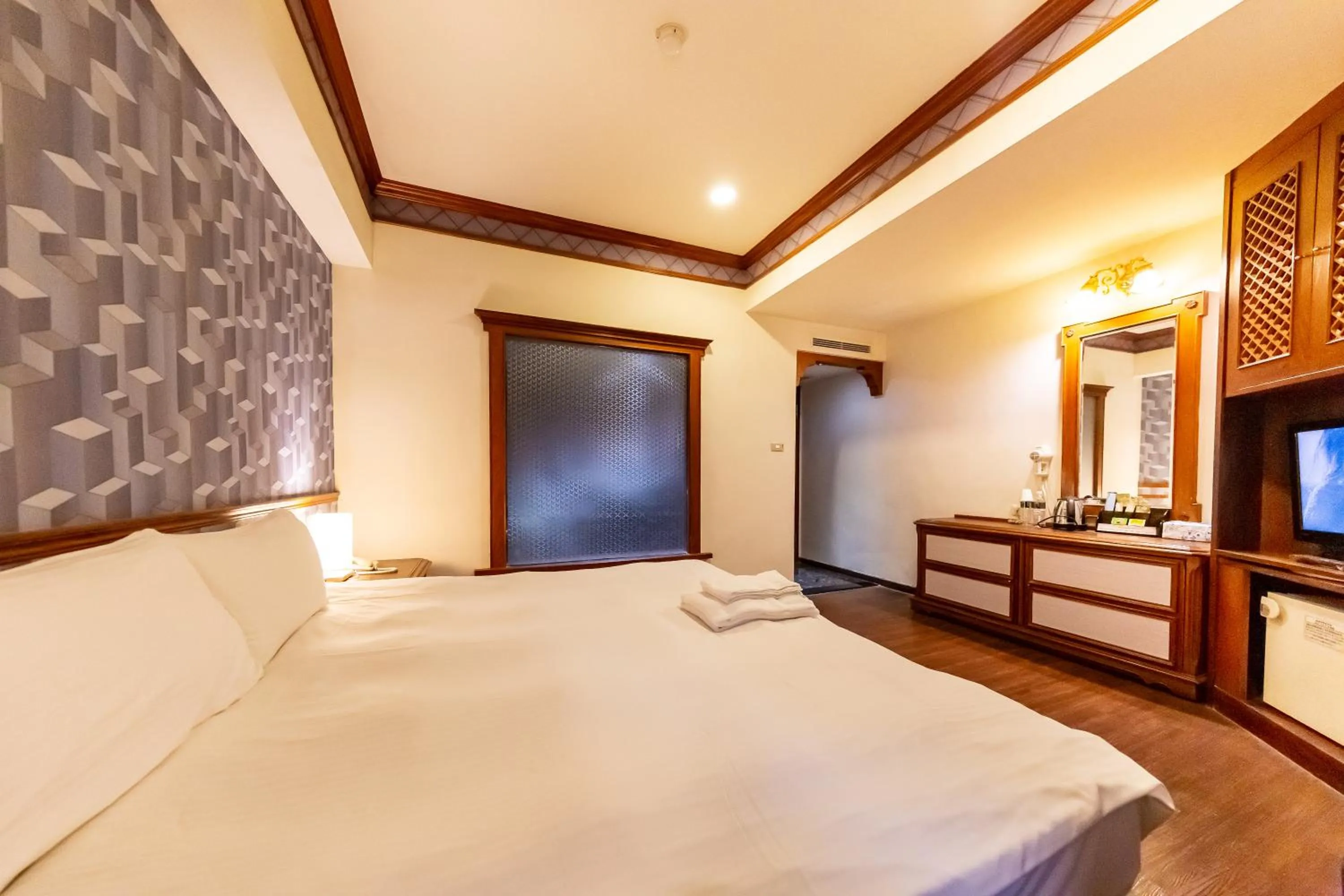 Bed in I HI Sanduo Travel Hotel