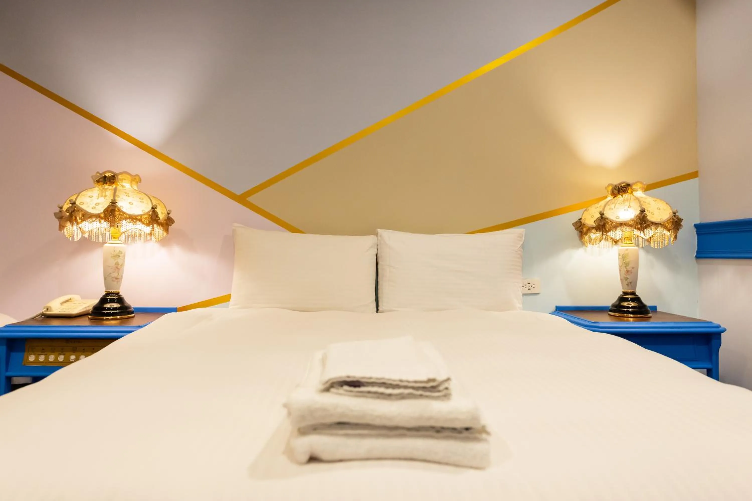 Bed in I HI Sanduo Travel Hotel