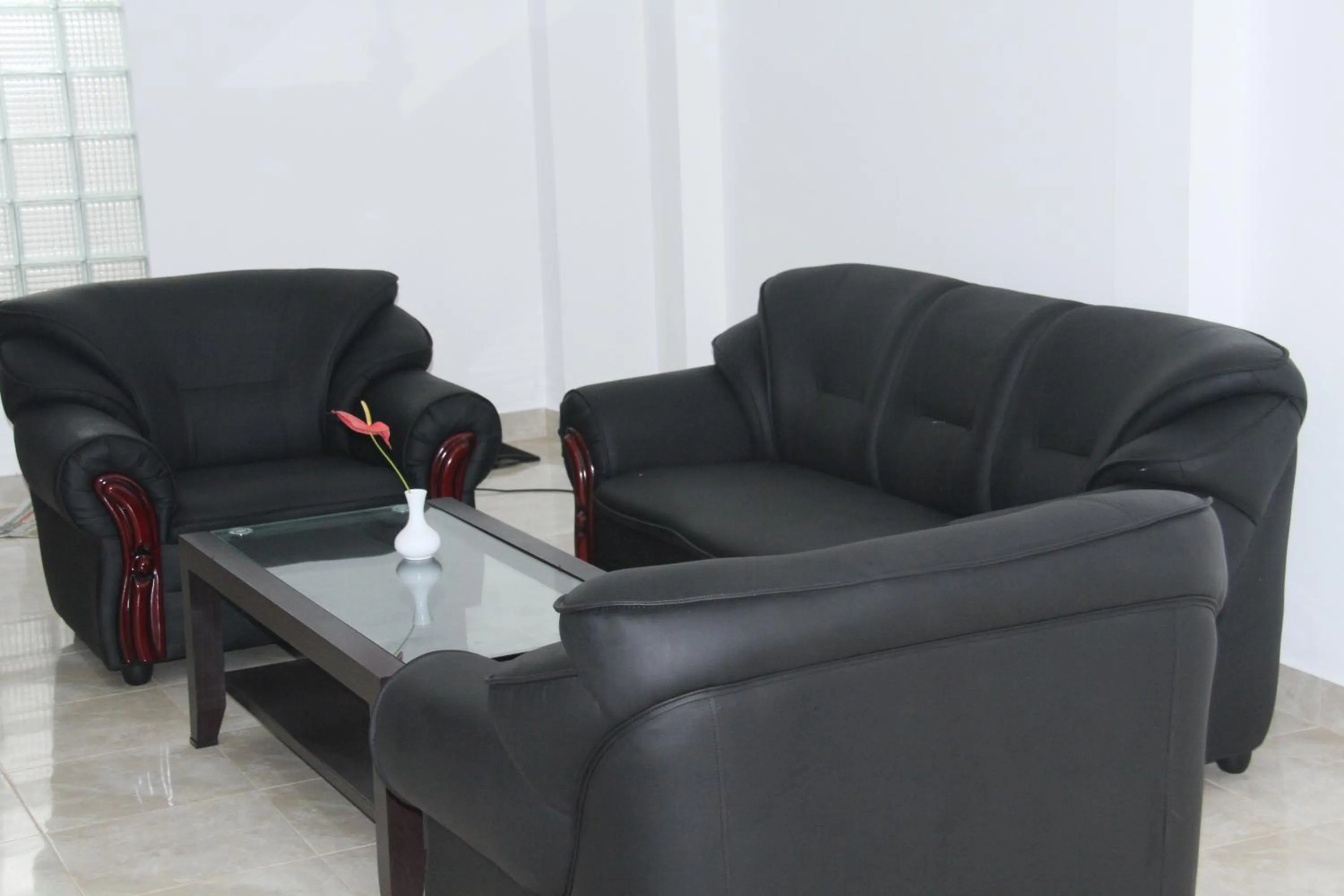 Communal lounge/ TV room in Supun Villa