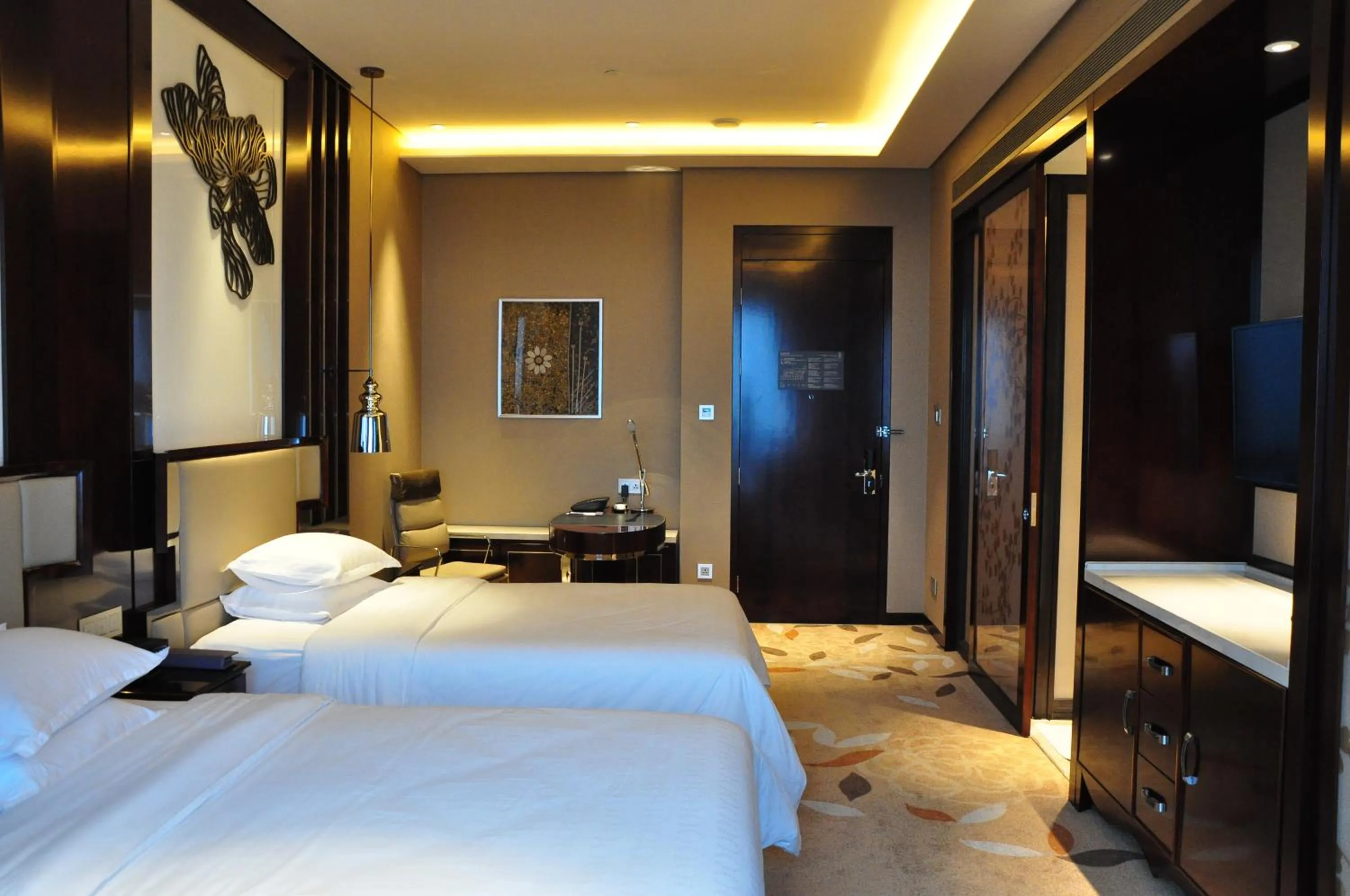 Bed in Sheraton Changde Wuling Hotel