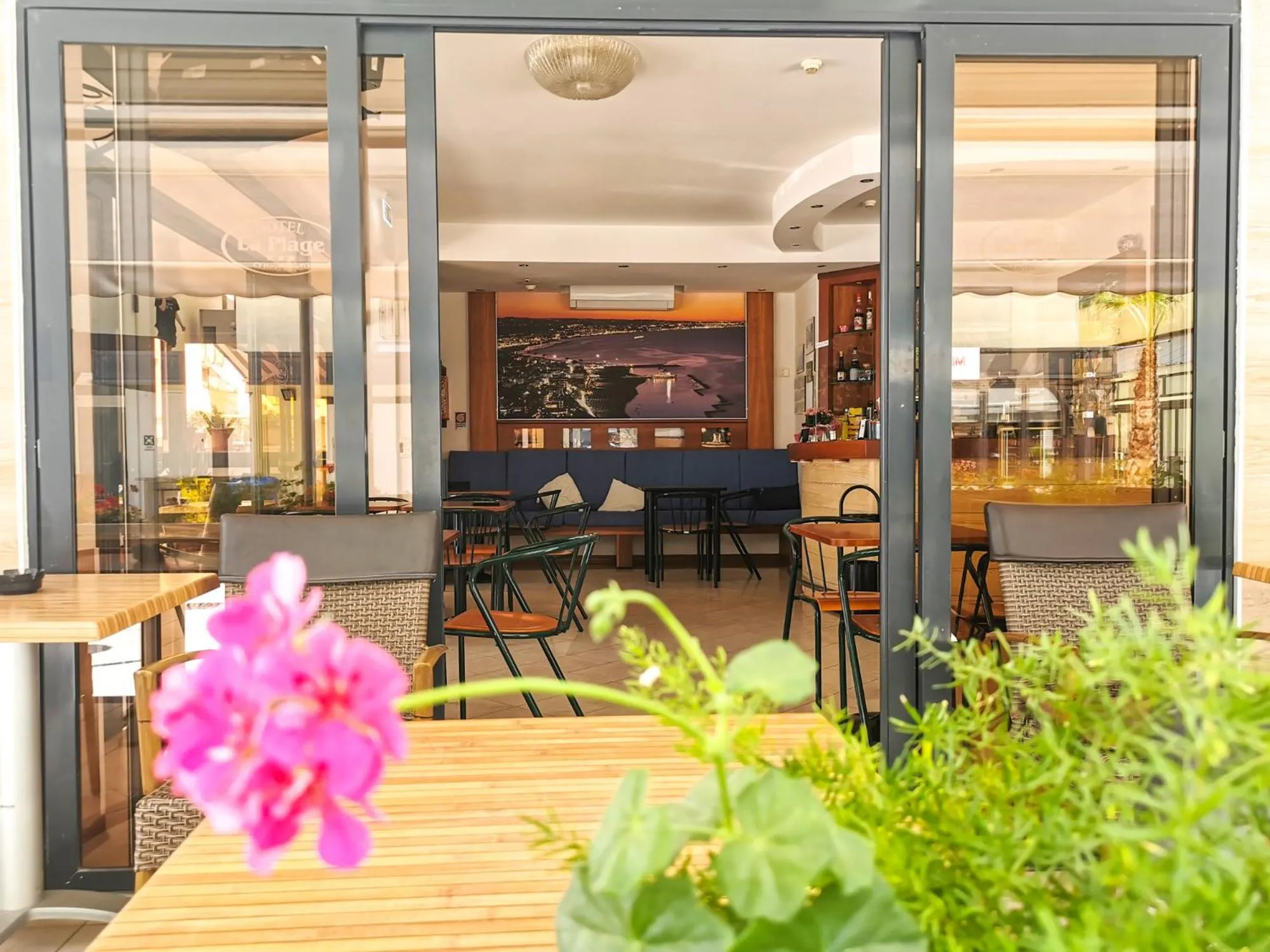 Communal lounge/ TV room in Hotel La Plage