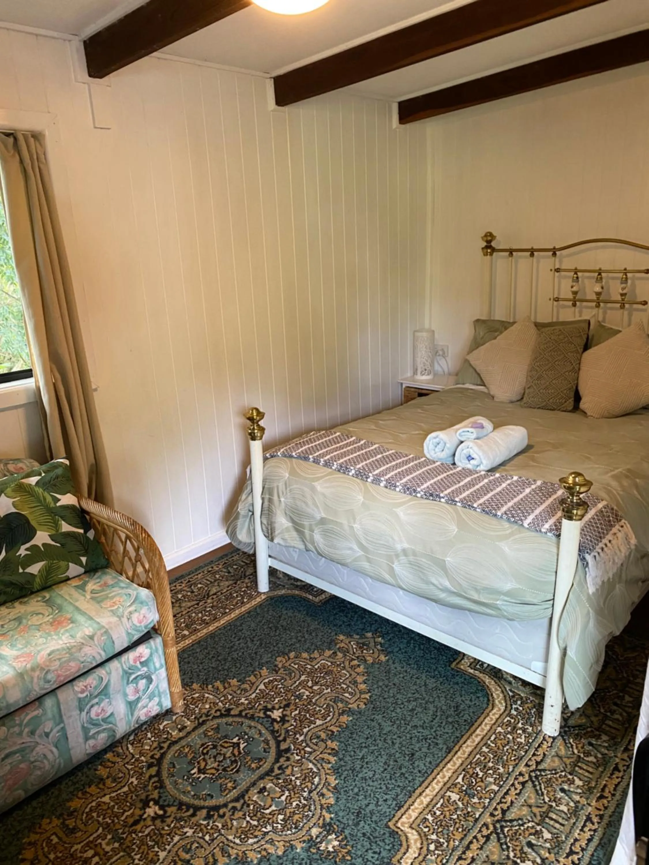 Bed in Nimbin waterfall retreat