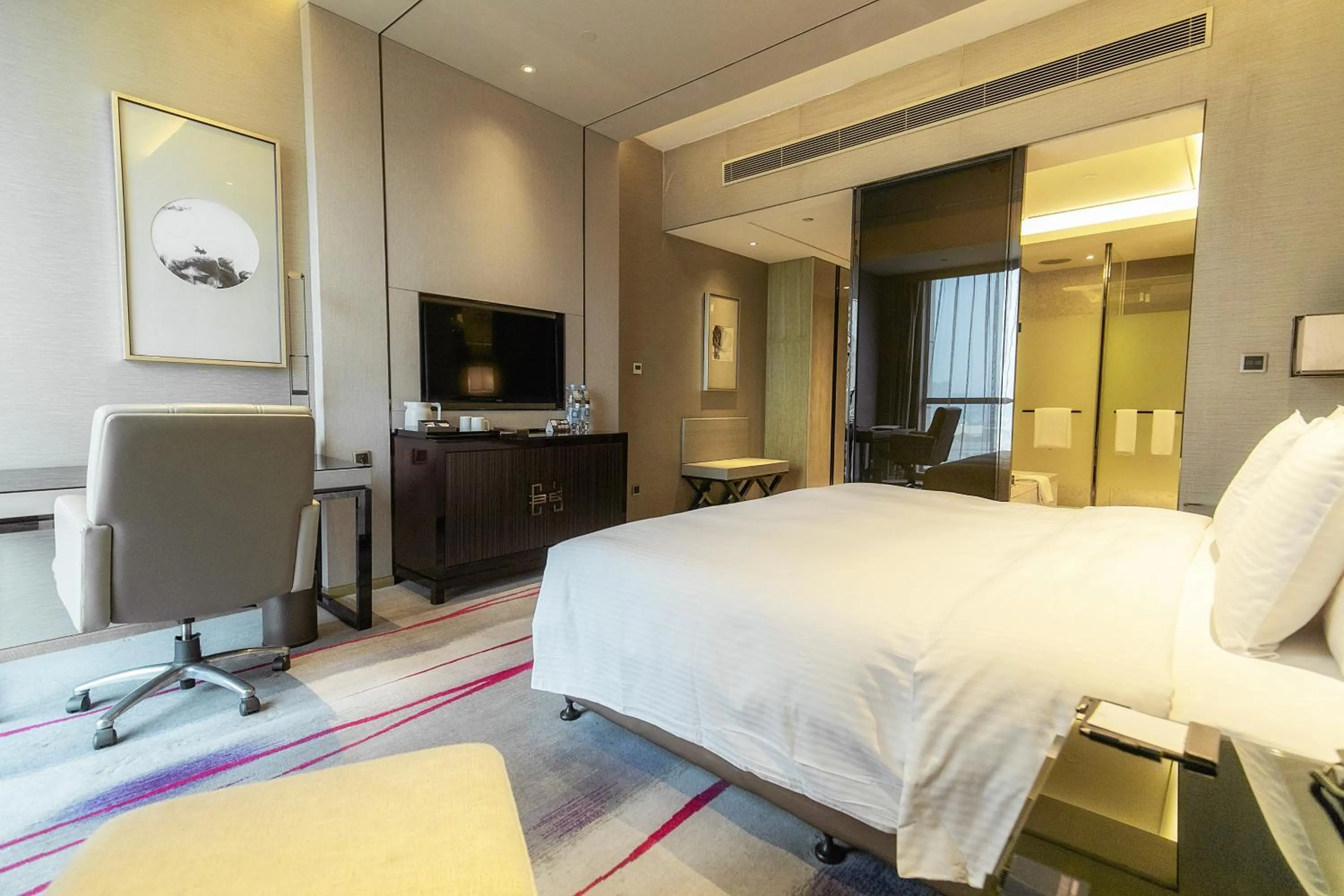 Bed in Maanshan Wanda Realm Hotel