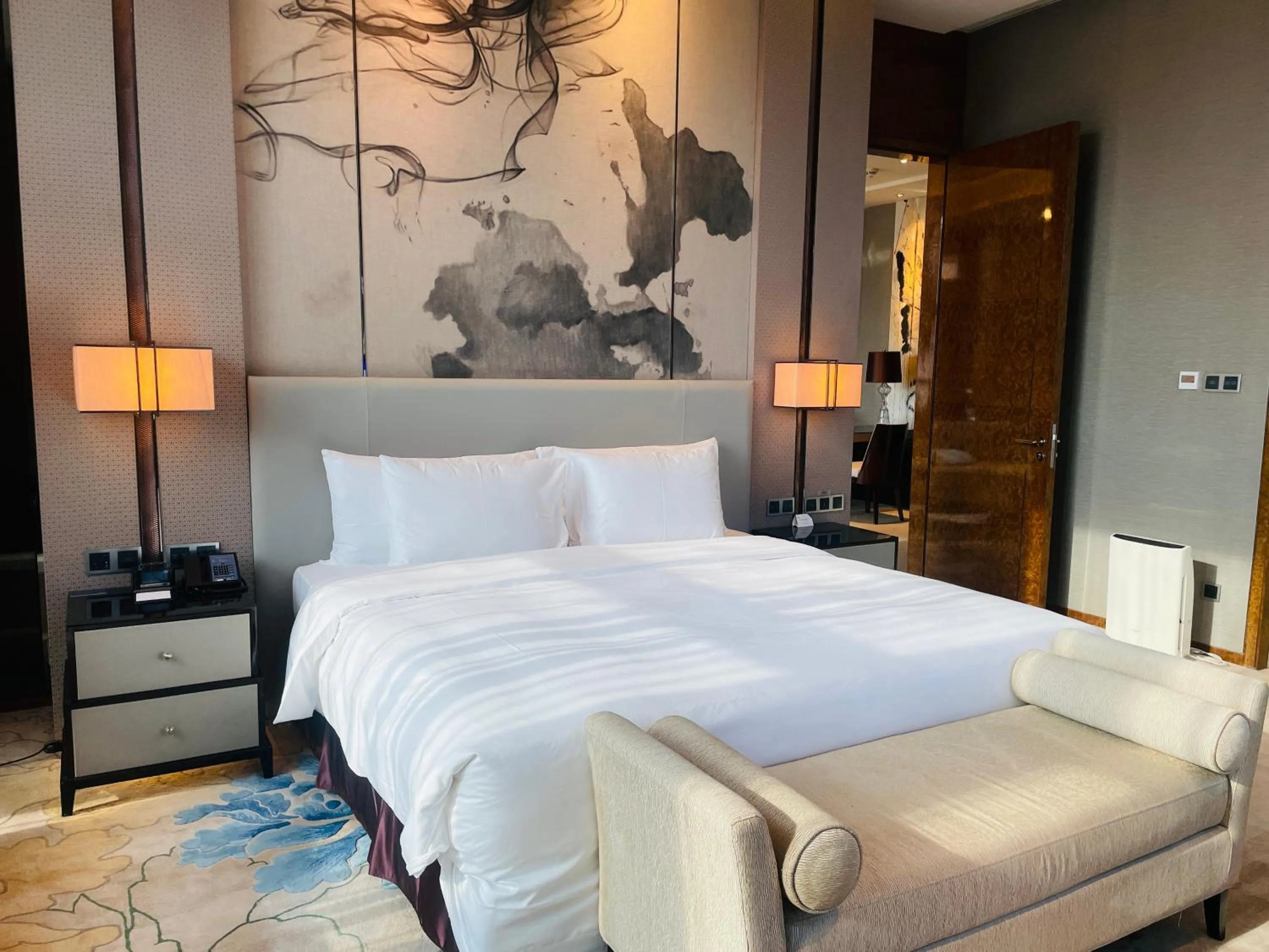 Bed in Maanshan Wanda Realm Hotel