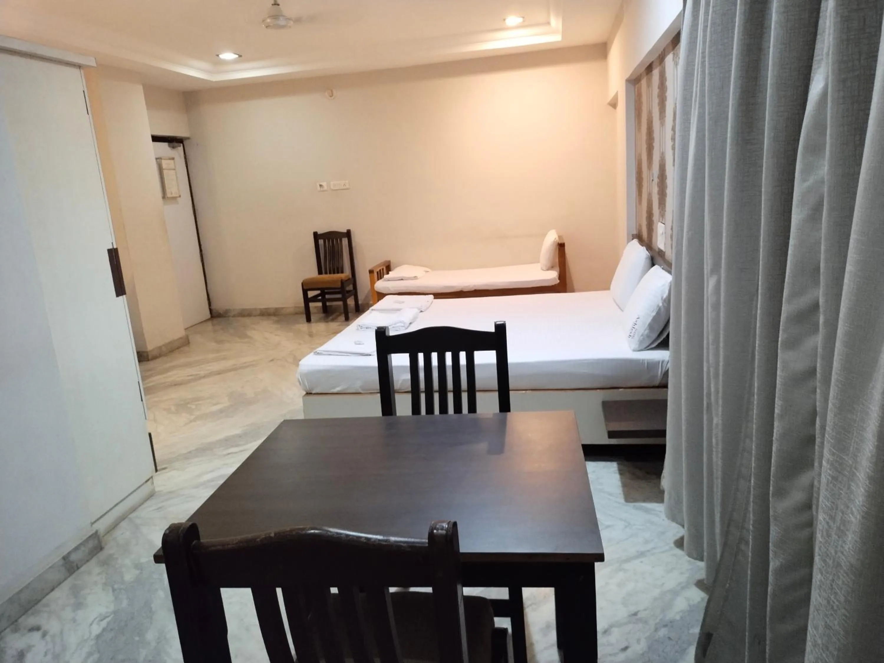 Bed in Hotel Ashlesh Manipal