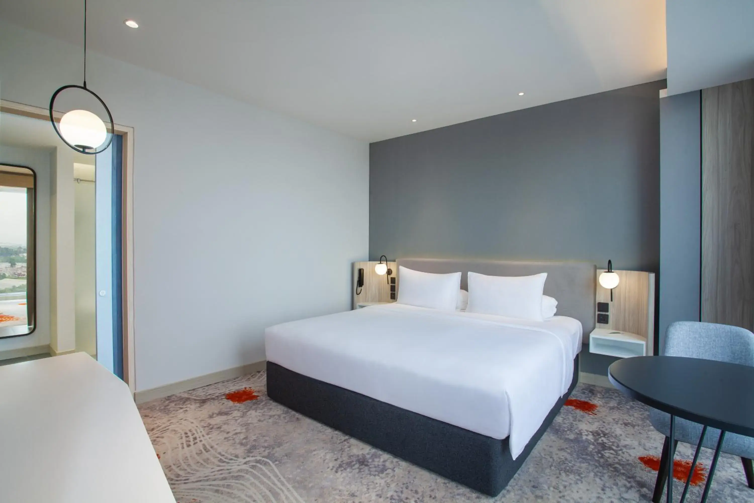 Bedroom, Bed in HARRIS Hotel & Convention Cibinong City Mall Bogor Bedroom, Bed in HARRIS Hotel & Convention Cibinong City Mall Bogor