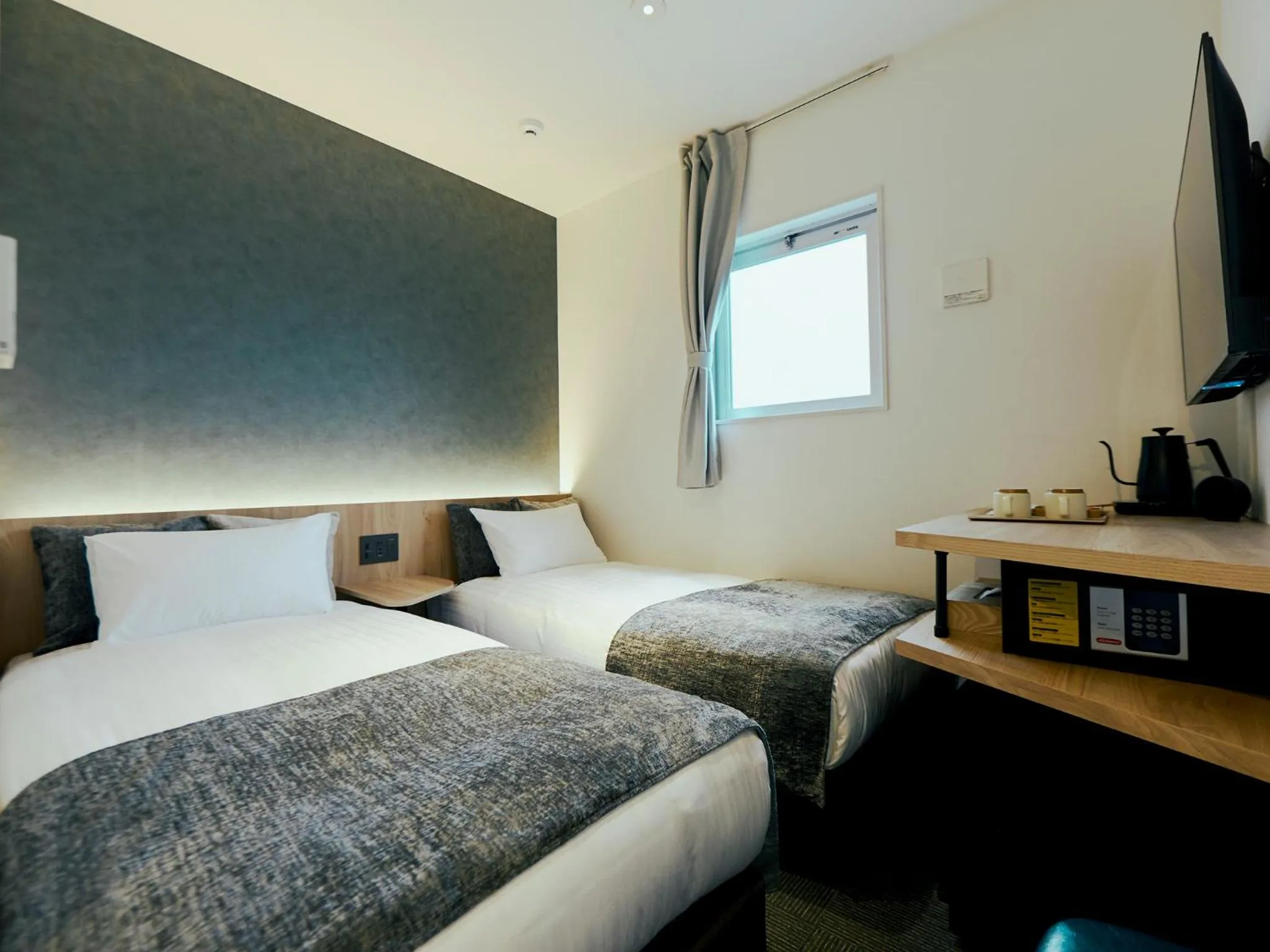 Bed in R Hotel Kansai Airport