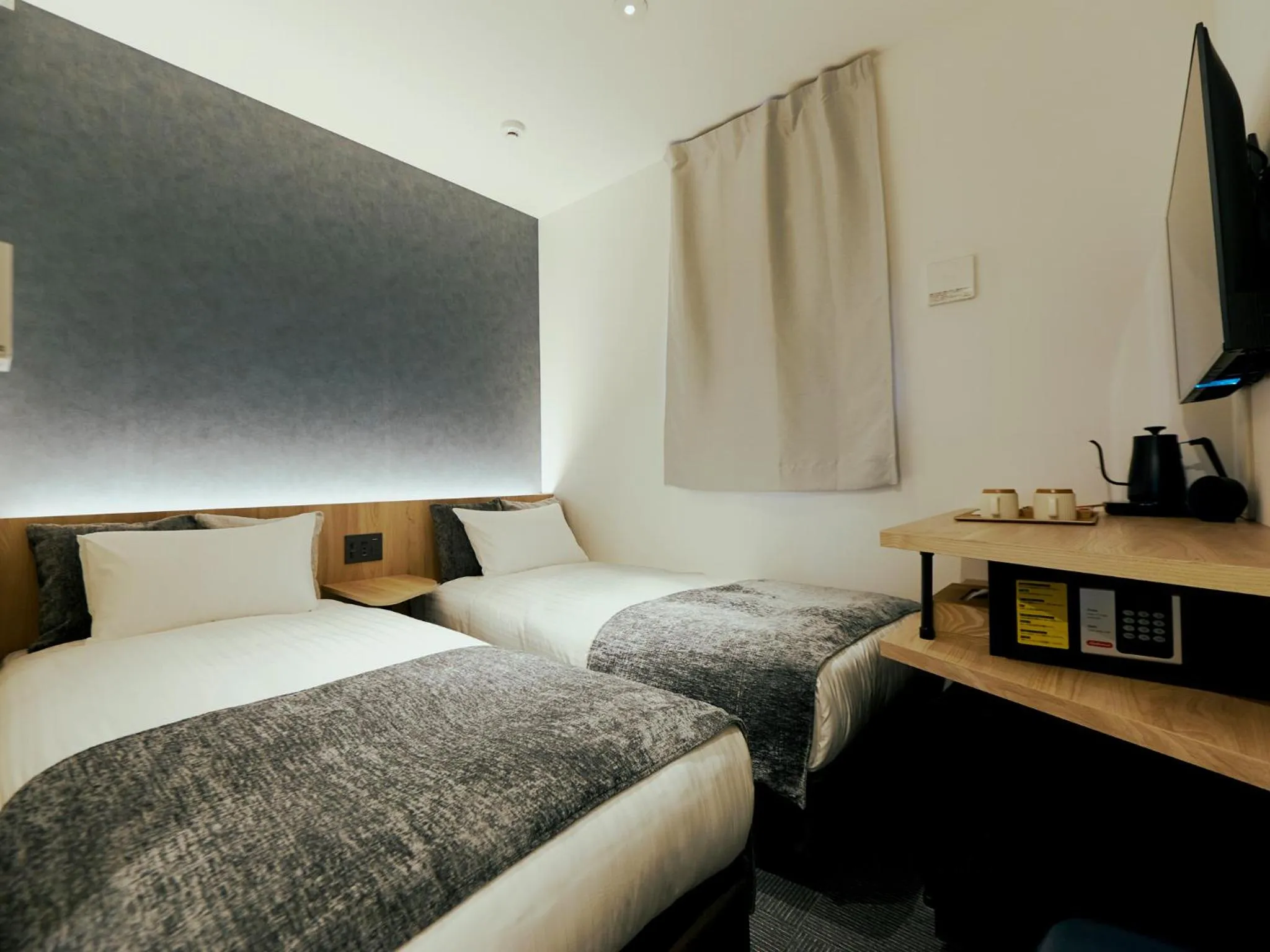 Bed in R Hotel Kansai Airport