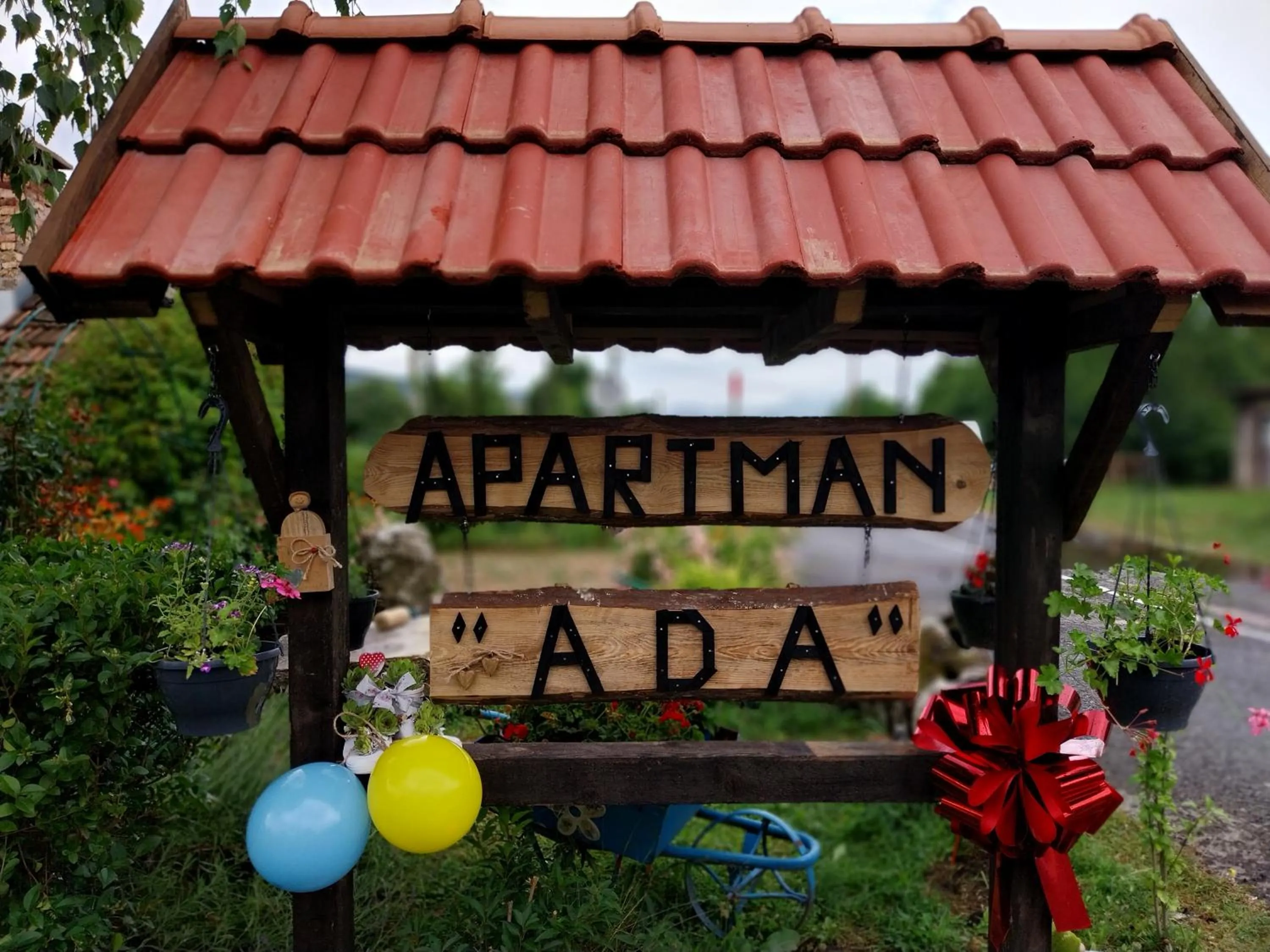 Property logo or sign in Apartment Ada bed & breakfast