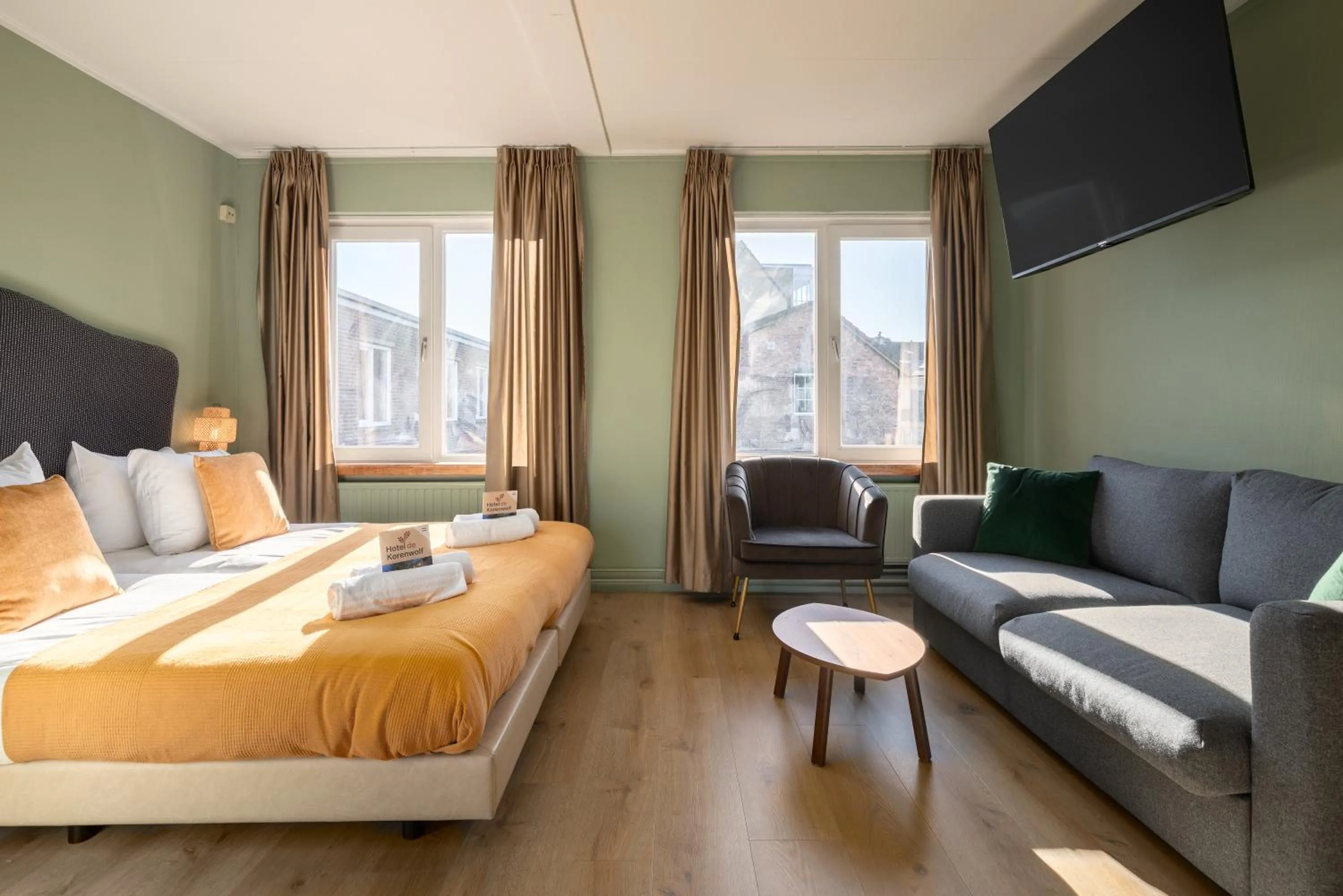 Living room, Bed in Hotel de Korenwolf