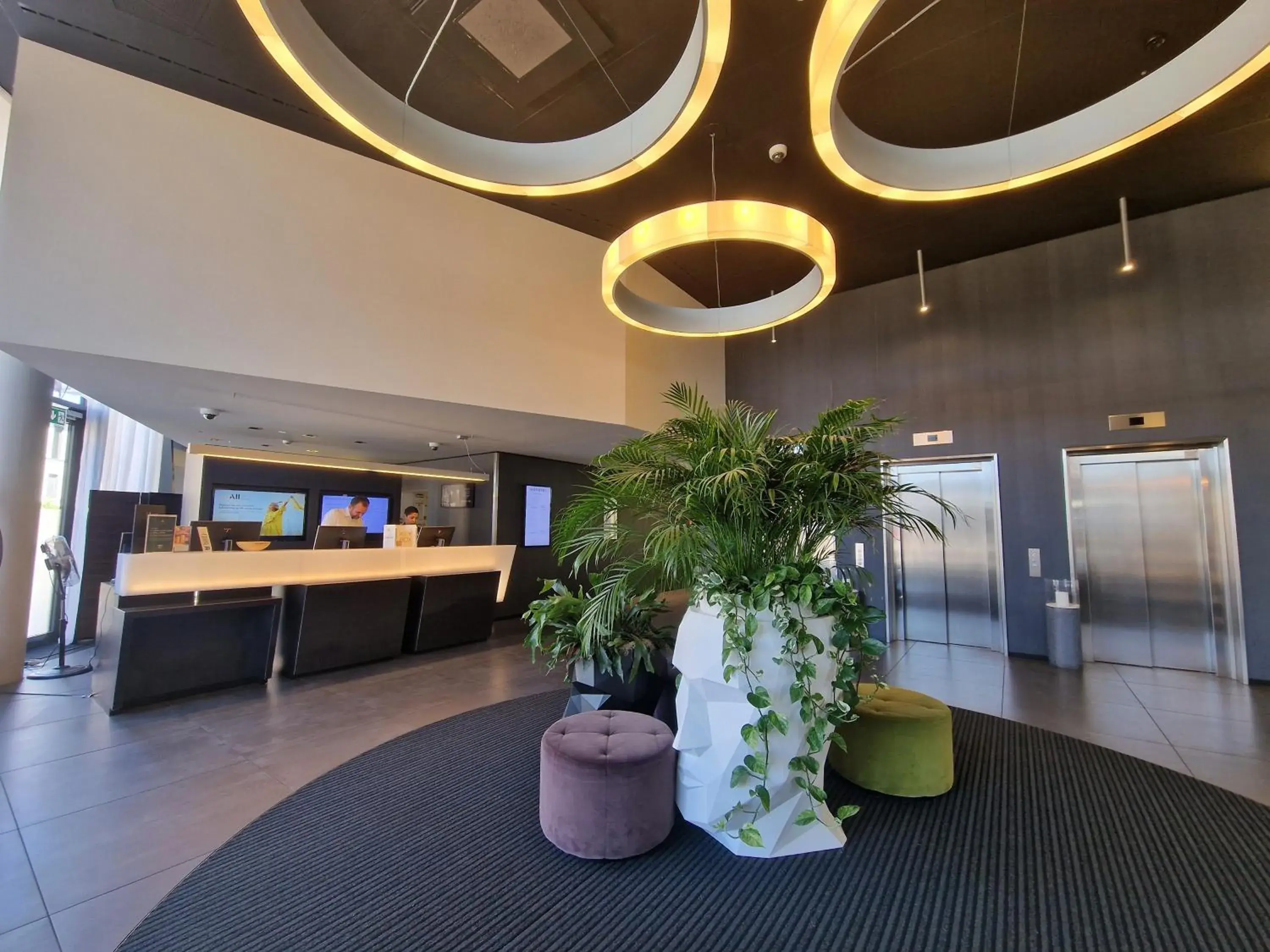 Lobby or reception in Novotel Basel City Lobby or reception in Novotel Basel City