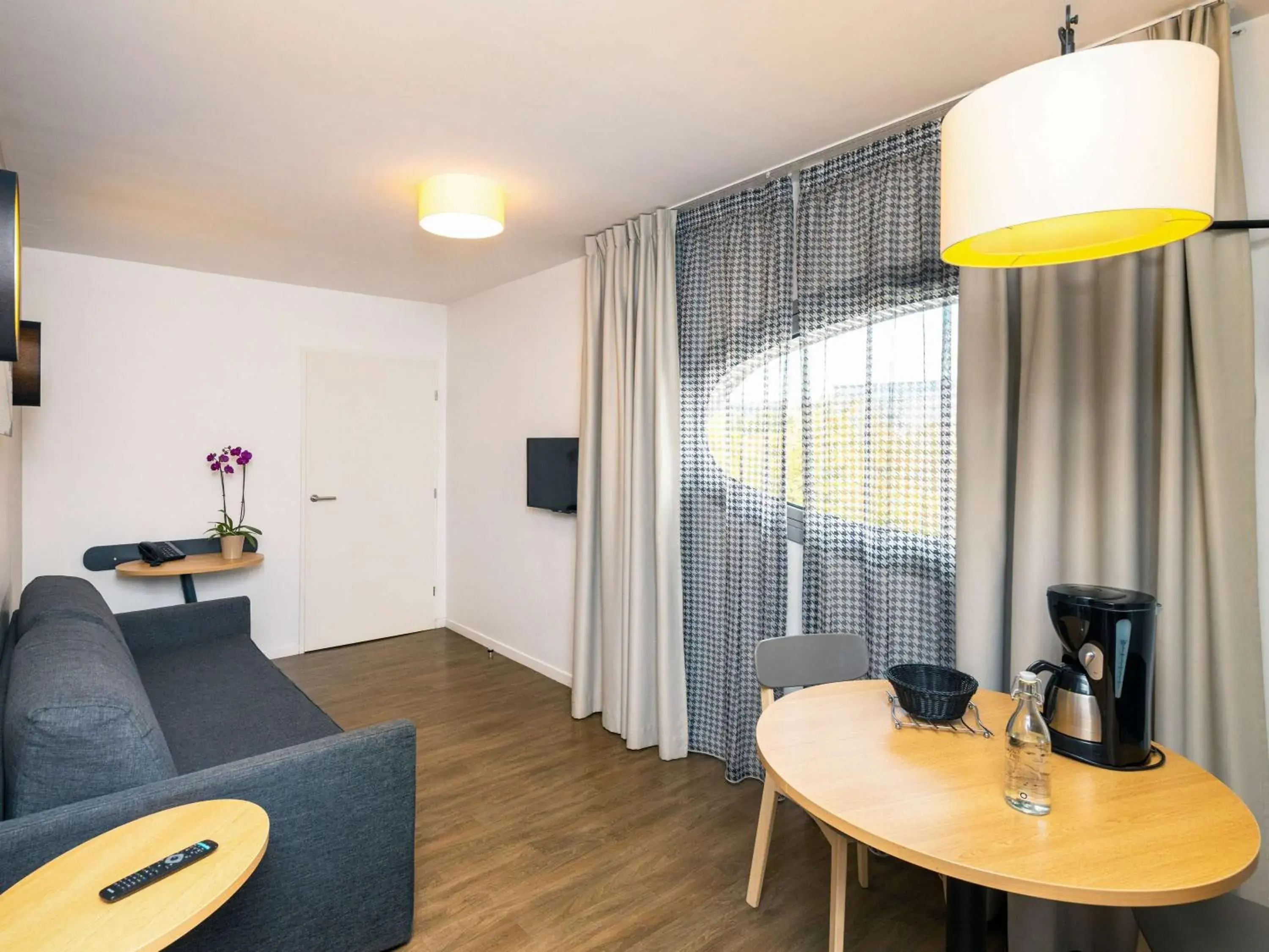 Living room in Aparthotel Adagio Access Nancy Centre Living room in Aparthotel Adagio Access Nancy Centre