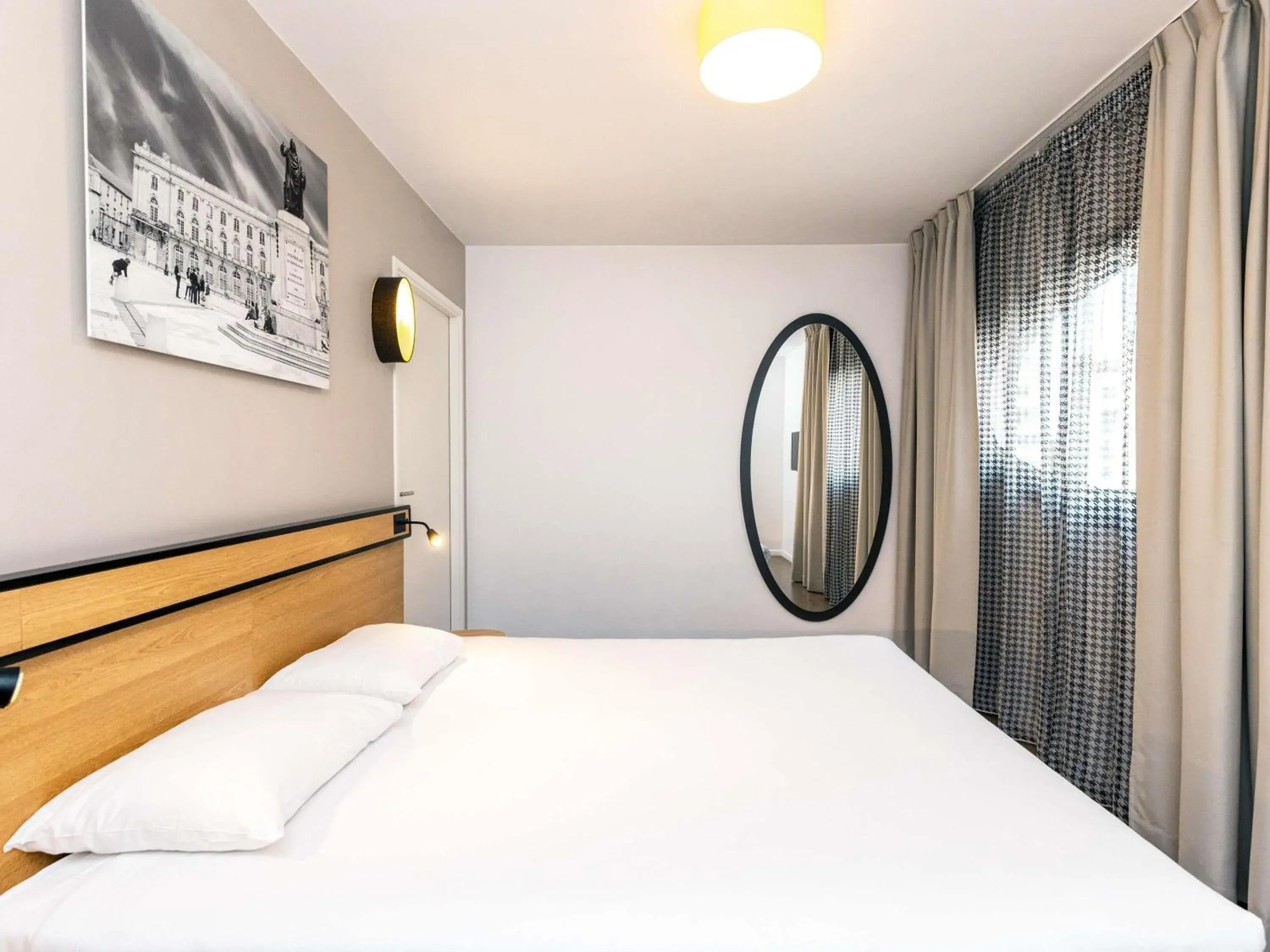 Bedroom, Bed in Aparthotel Adagio Access Nancy Centre Bedroom, Bed in Aparthotel Adagio Access Nancy Centre