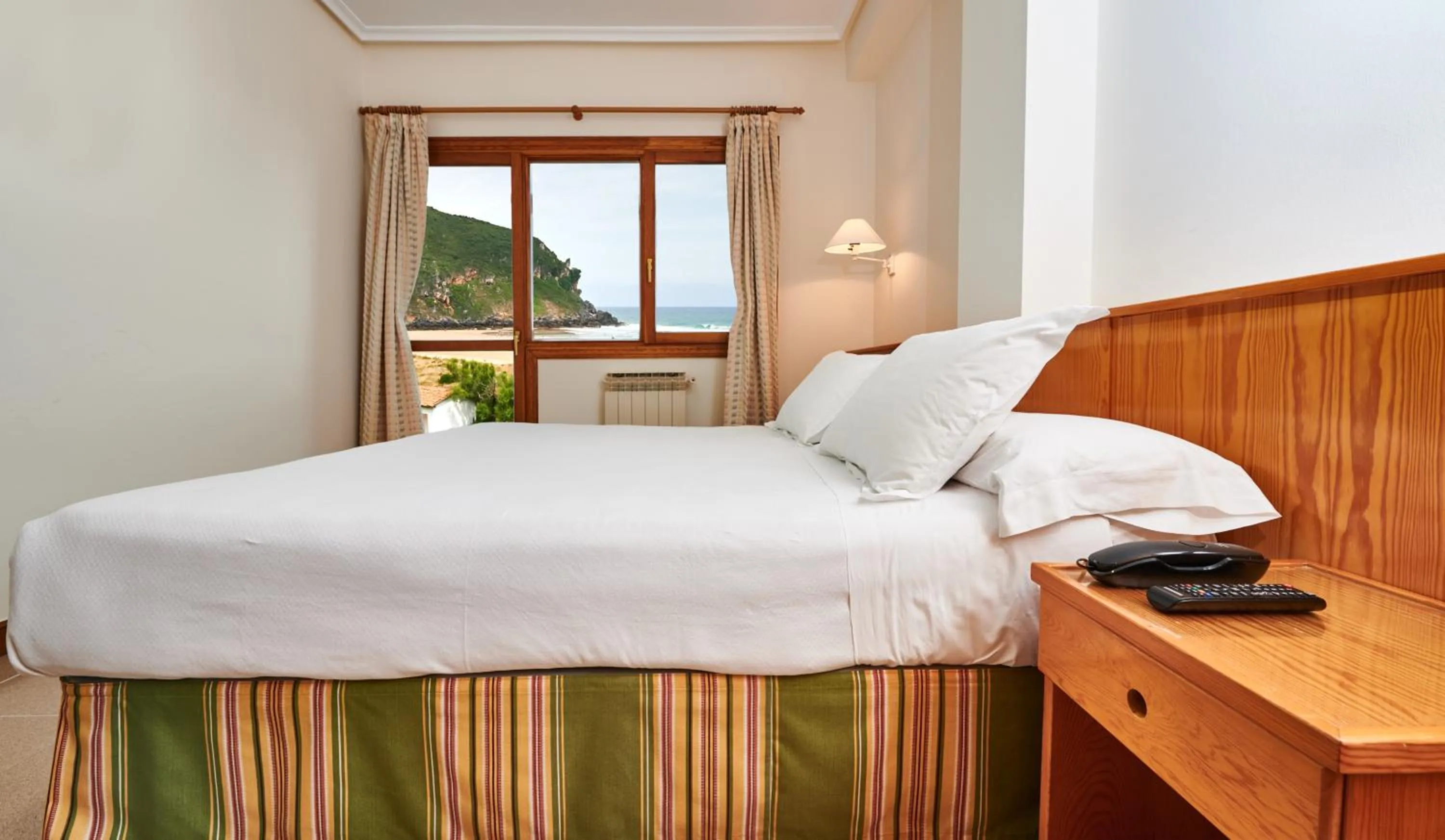 Bed in Hotel Juan de la Cosa