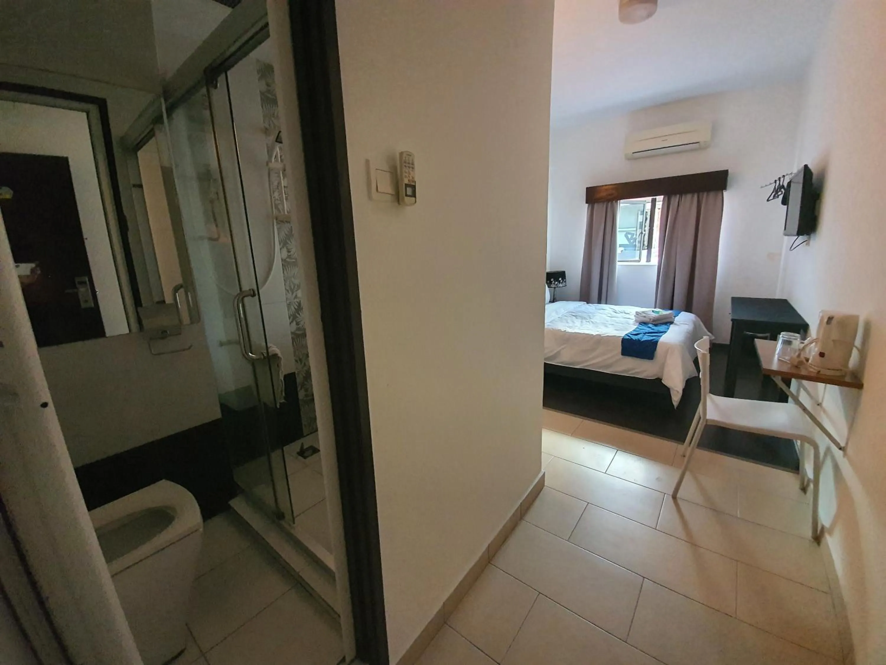 Bed in Warisan Hotel Kota Kinabalu