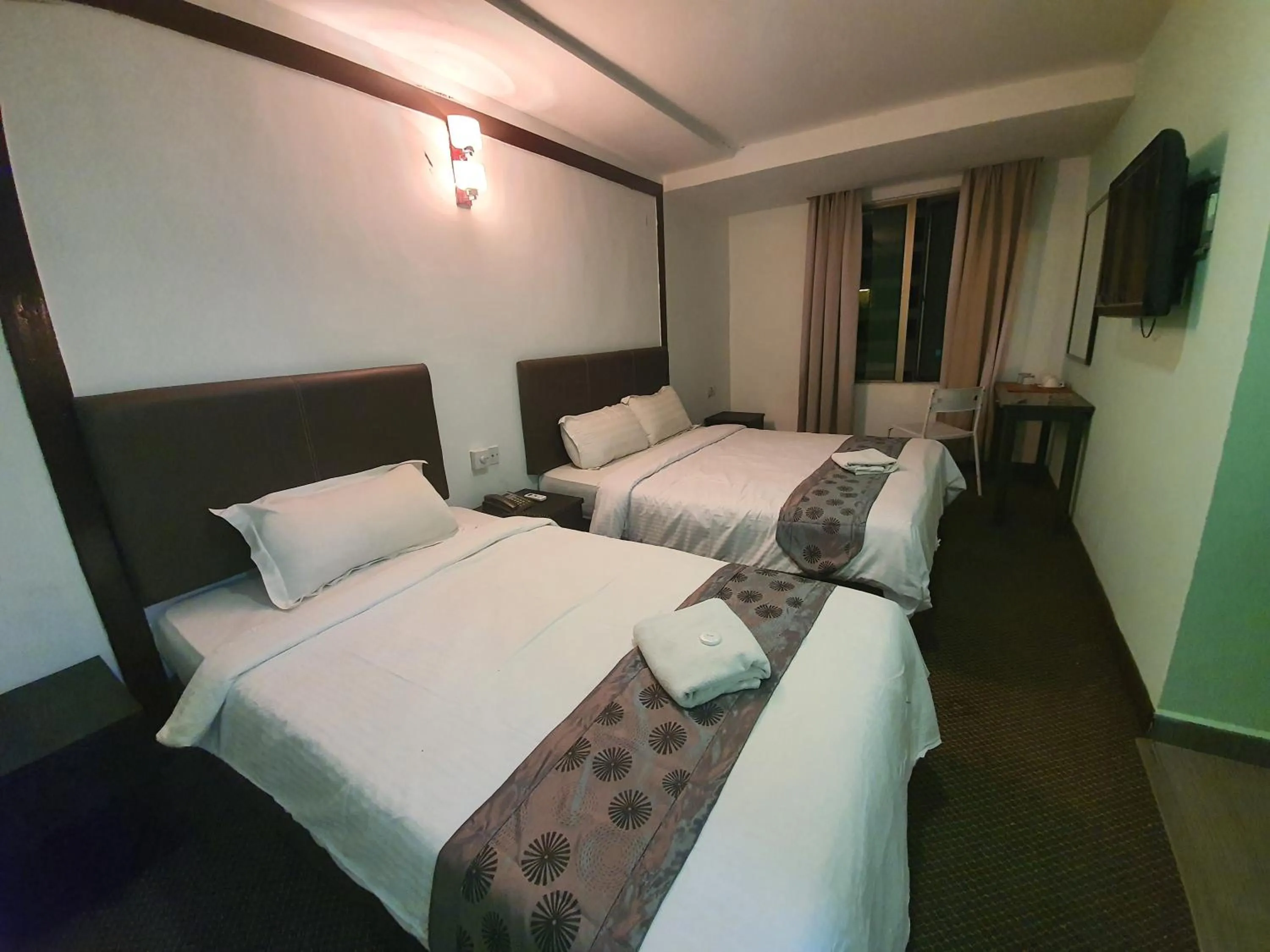 Bed in Warisan Hotel Kota Kinabalu