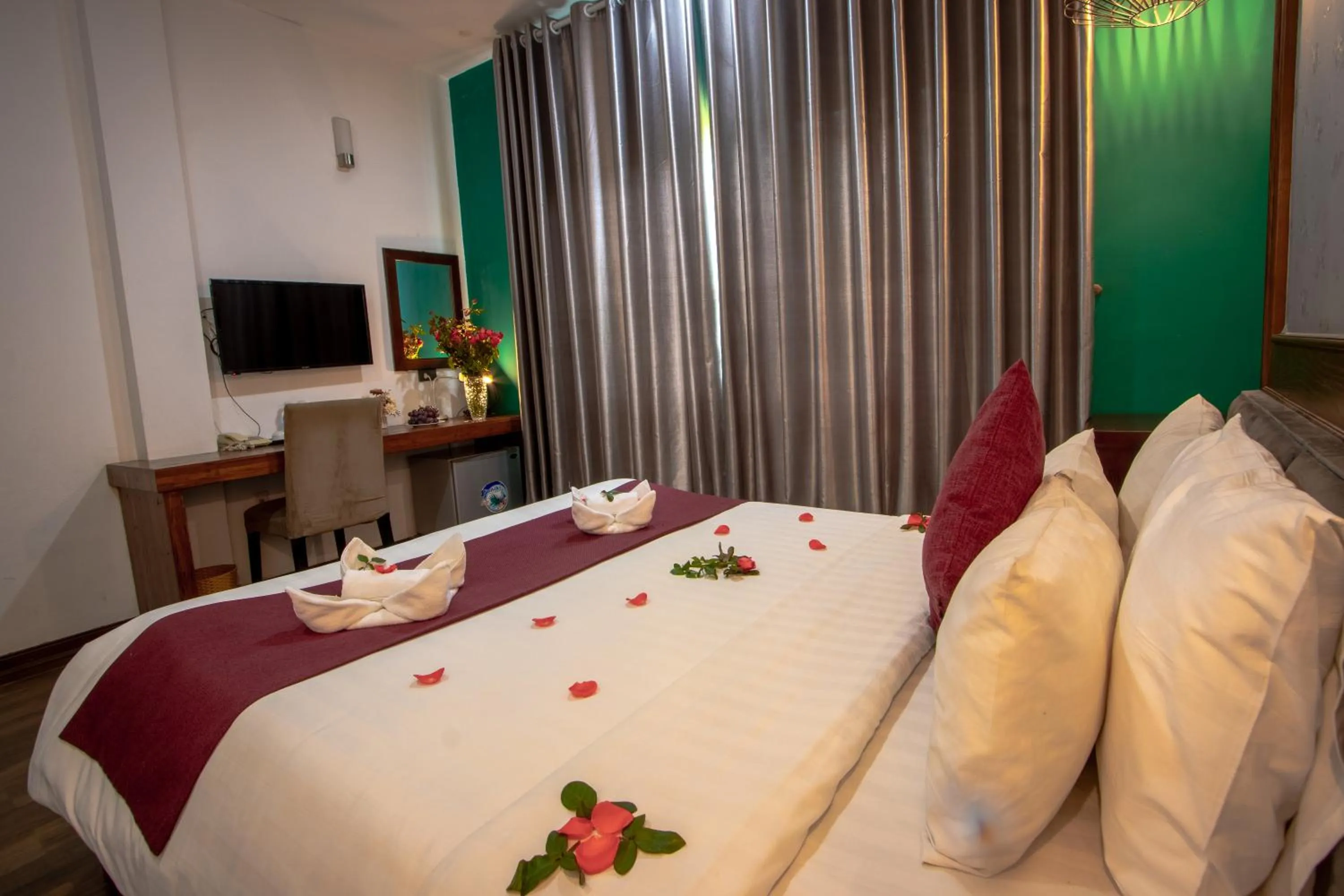 Bed in NT Elysian hotel