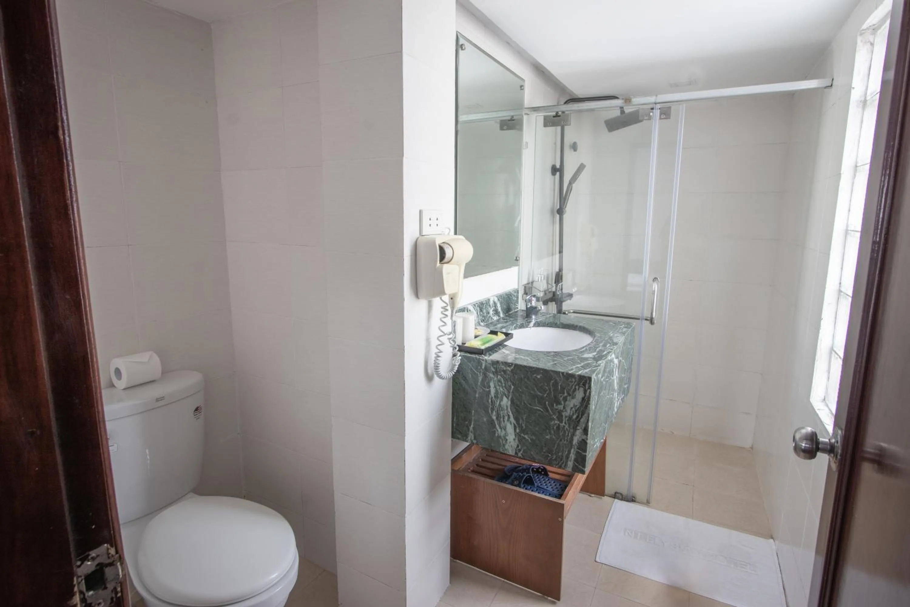 Toilet in NT Elysian hotel