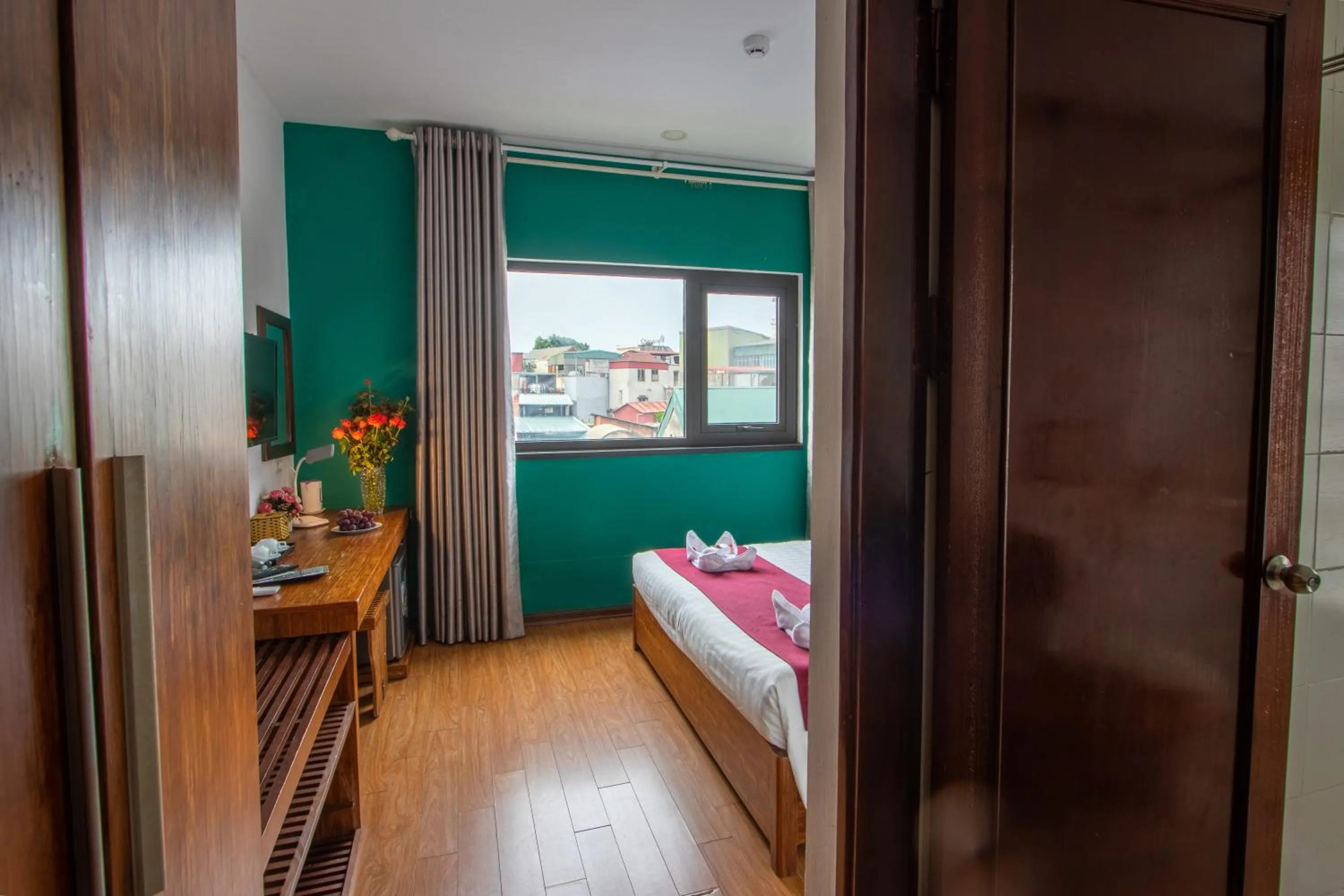 Photo of the whole room, Bed in NT Elysian hotel