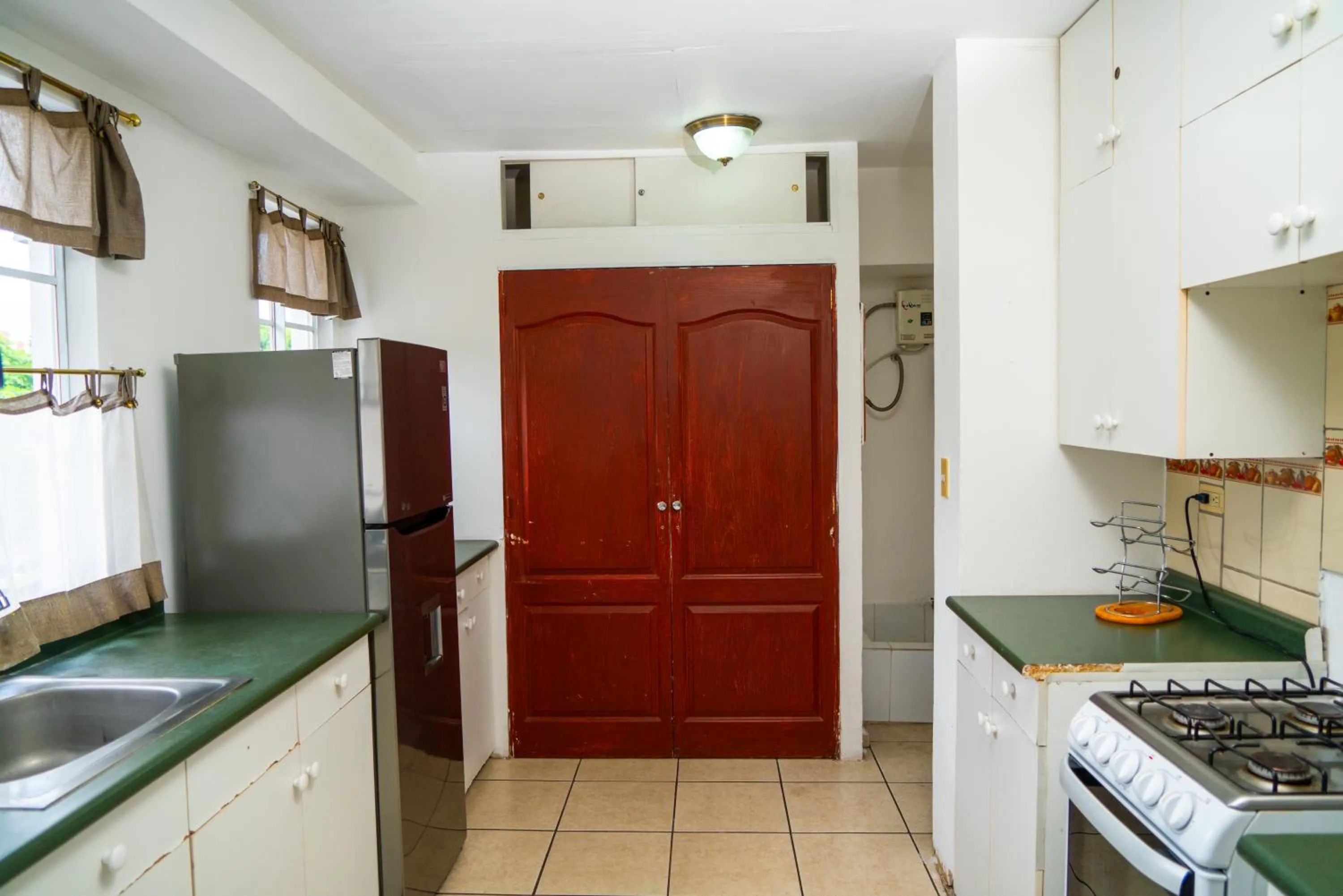 Kitchen or kitchenette in Suites & Apartments San Benito - Zona Rosa