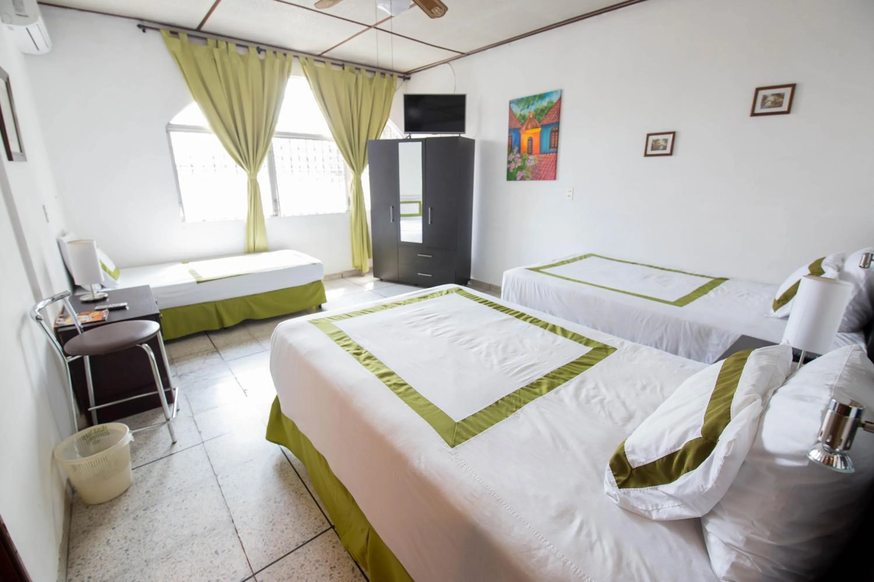 Bedroom, Bed in Suites & Apartments San Benito - Zona Rosa