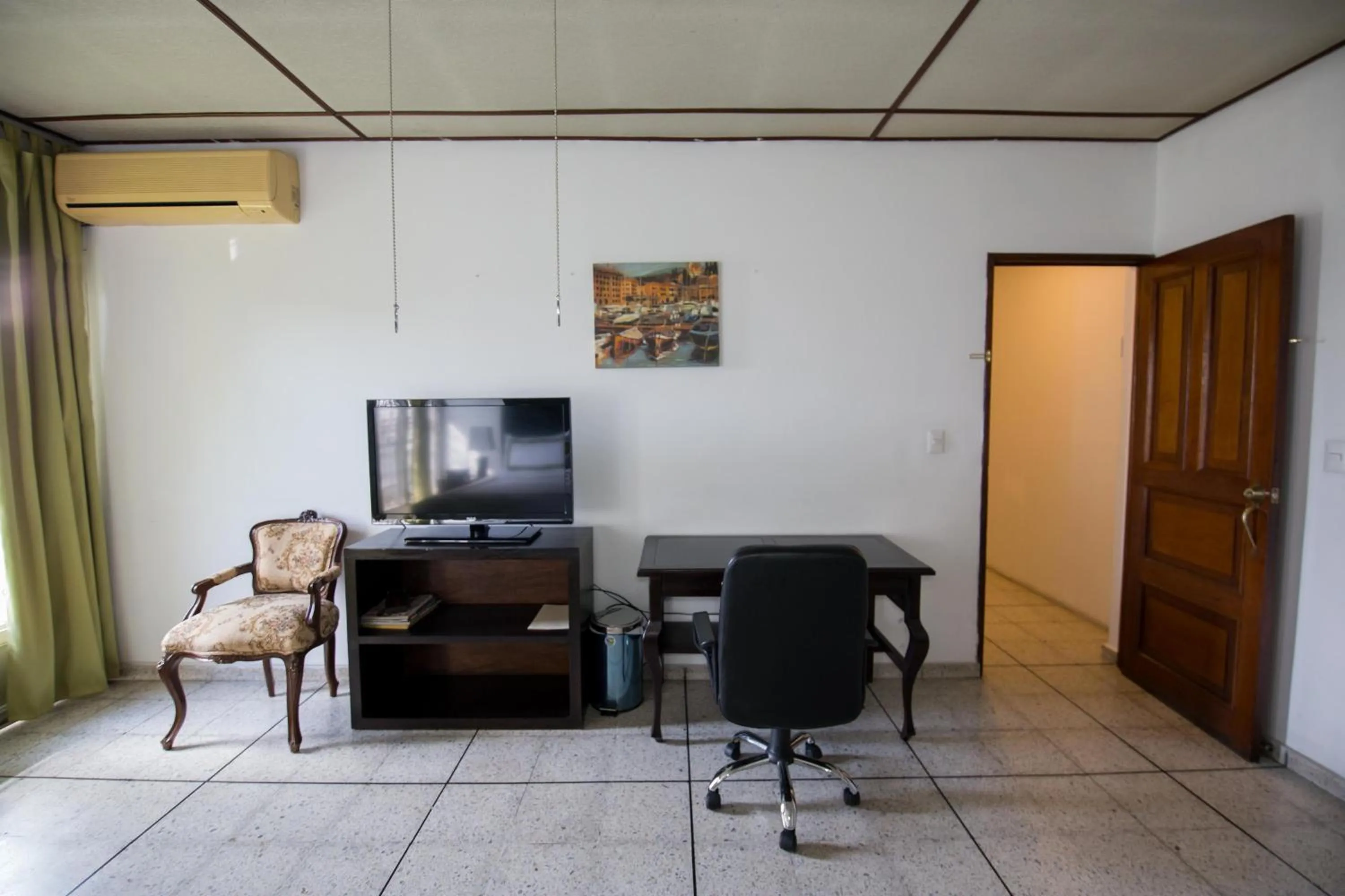 Bedroom in Suites & Apartments San Benito - Zona Rosa