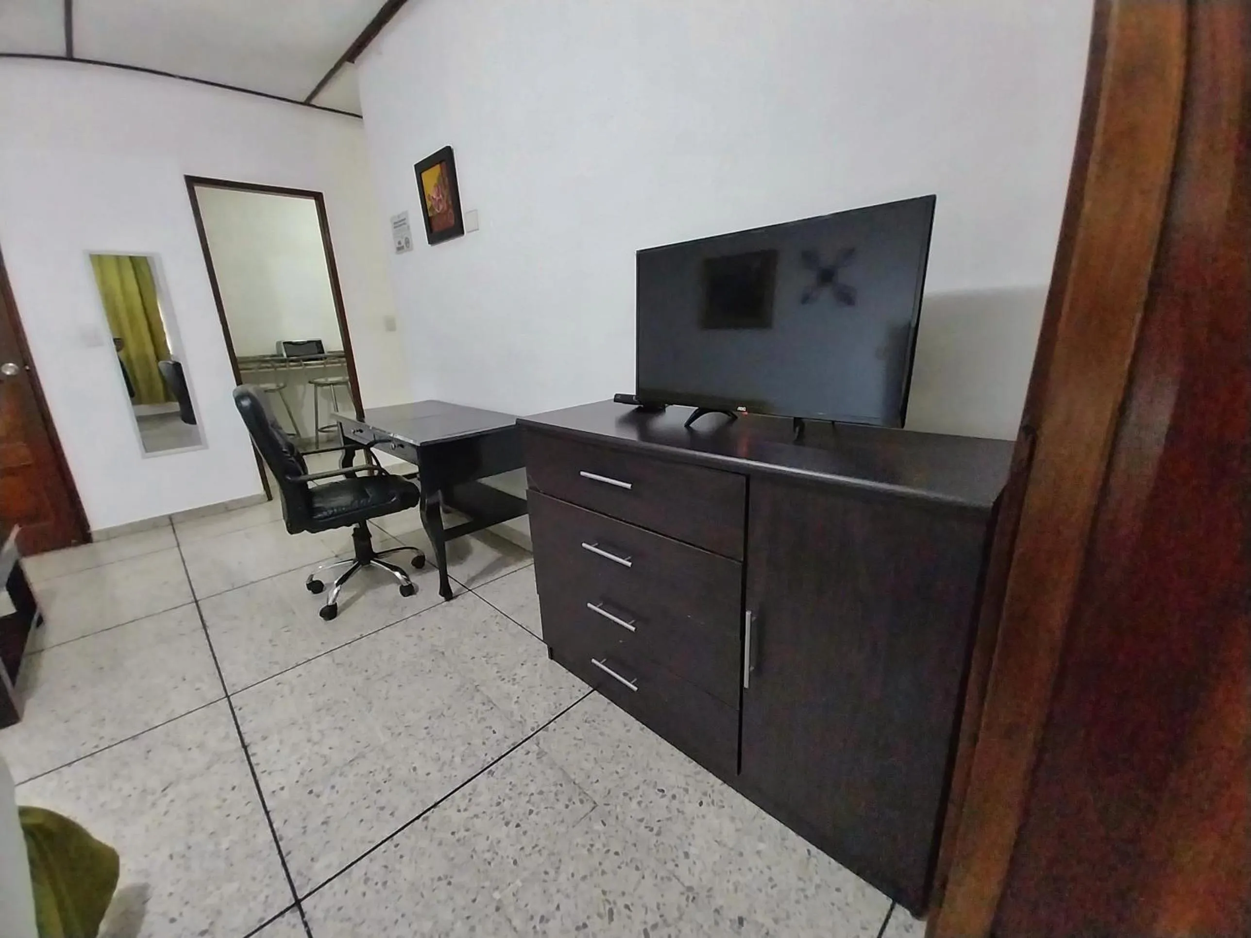 TV and multimedia in Suites & Apartments San Benito - Zona Rosa