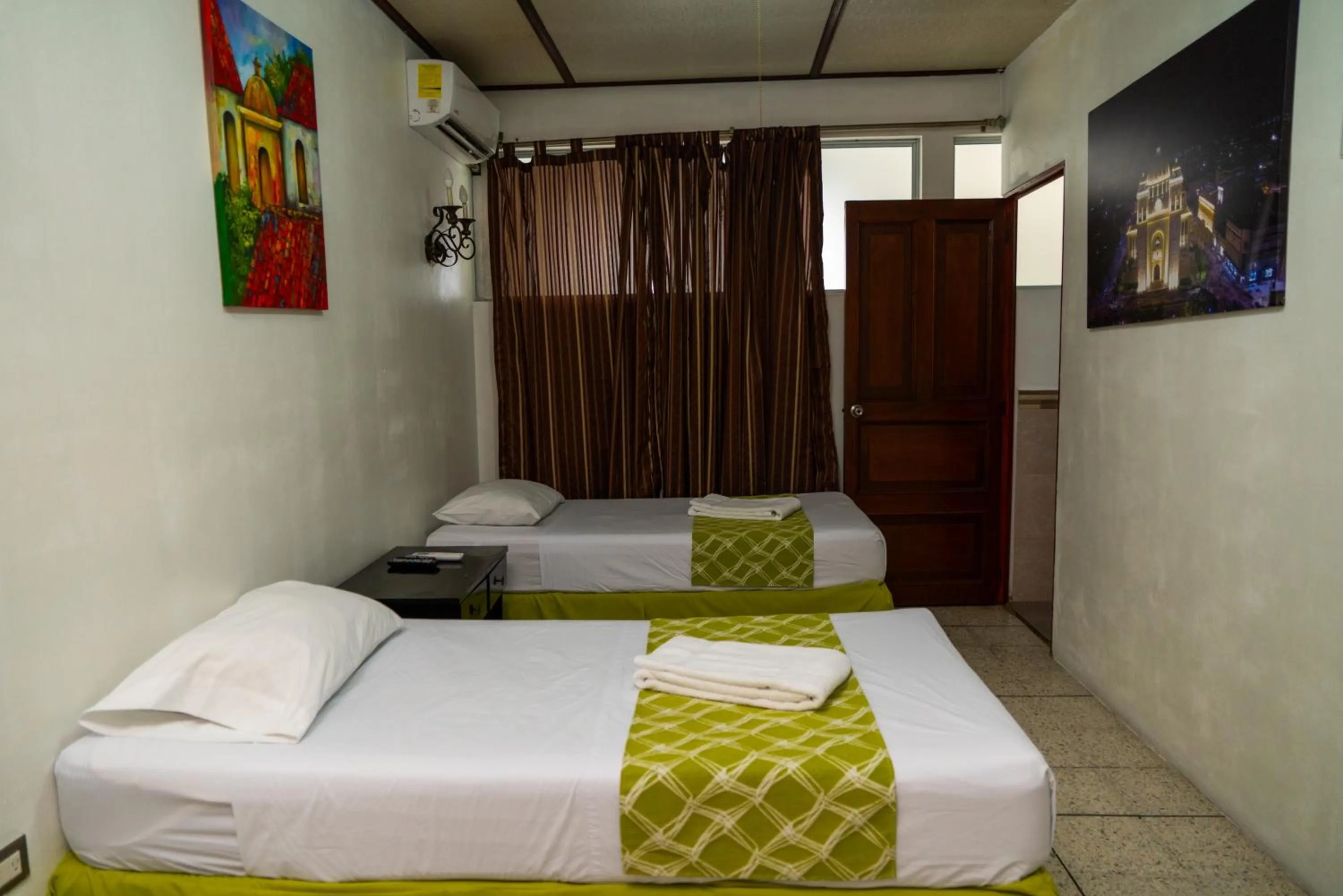 Bedroom, Bed in Suites & Apartments San Benito - Zona Rosa