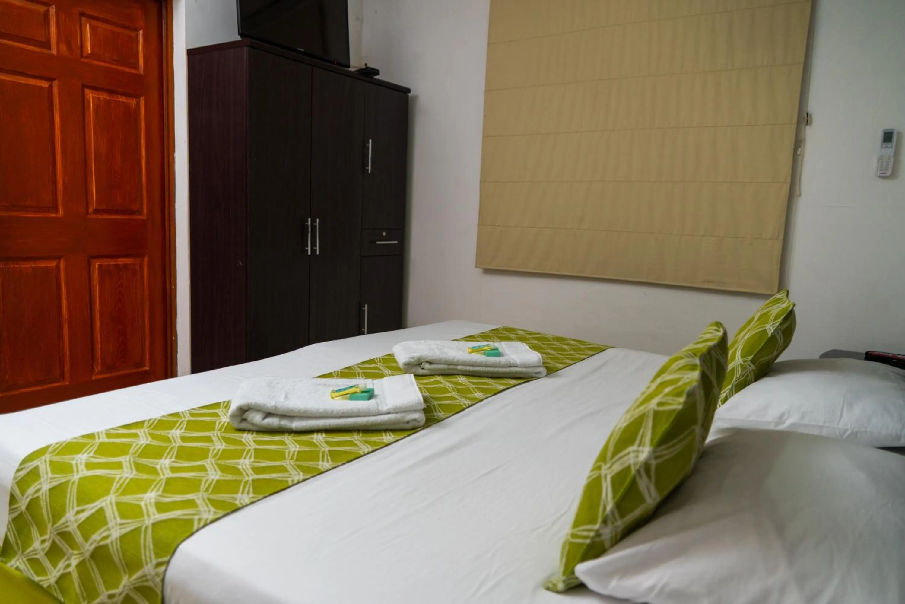 Bedroom, Bed in Suites & Apartments San Benito - Zona Rosa