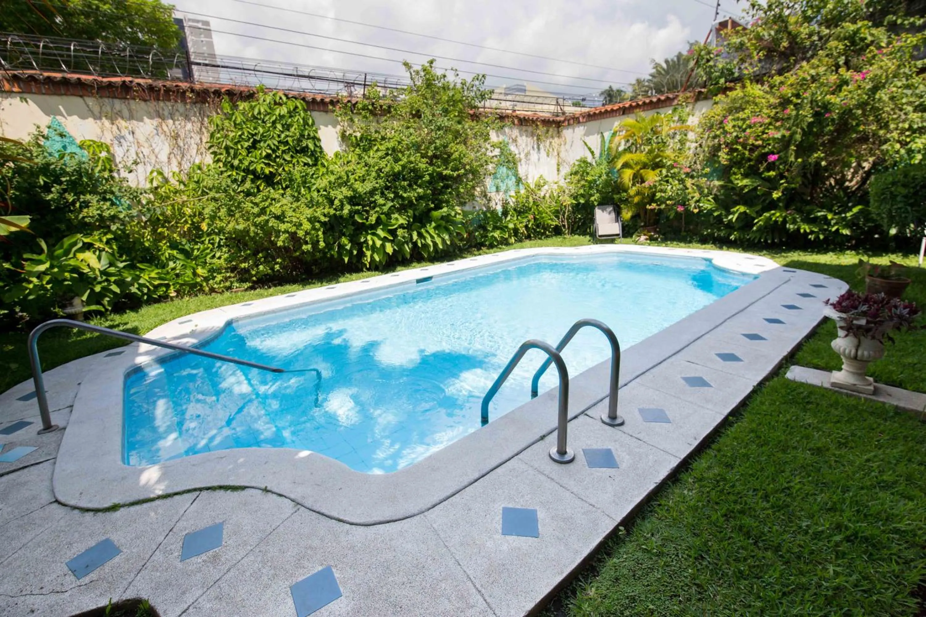 Swimming pool in Suites & Apartments San Benito - Zona Rosa