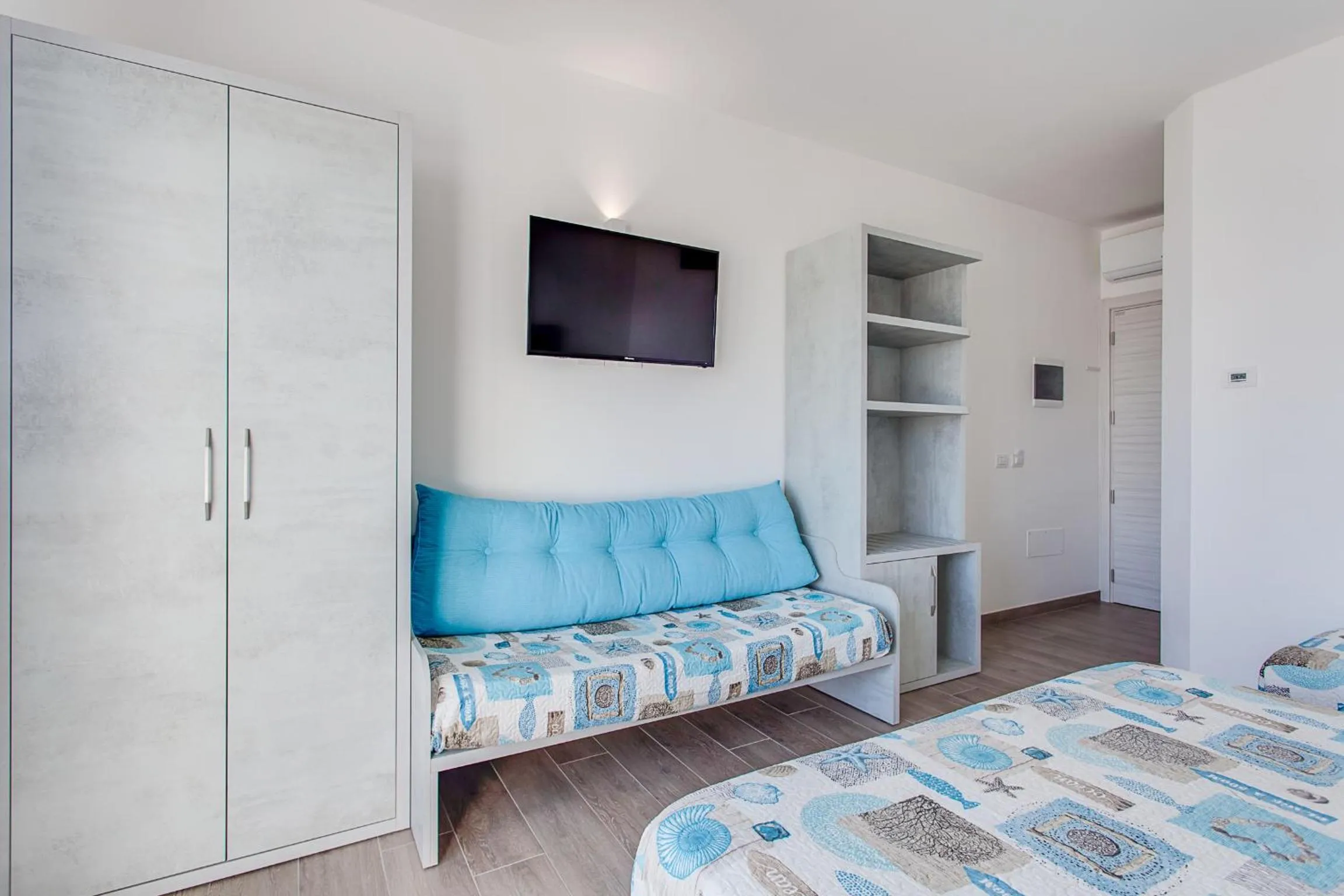 Bed in Hotel Asiago Beach