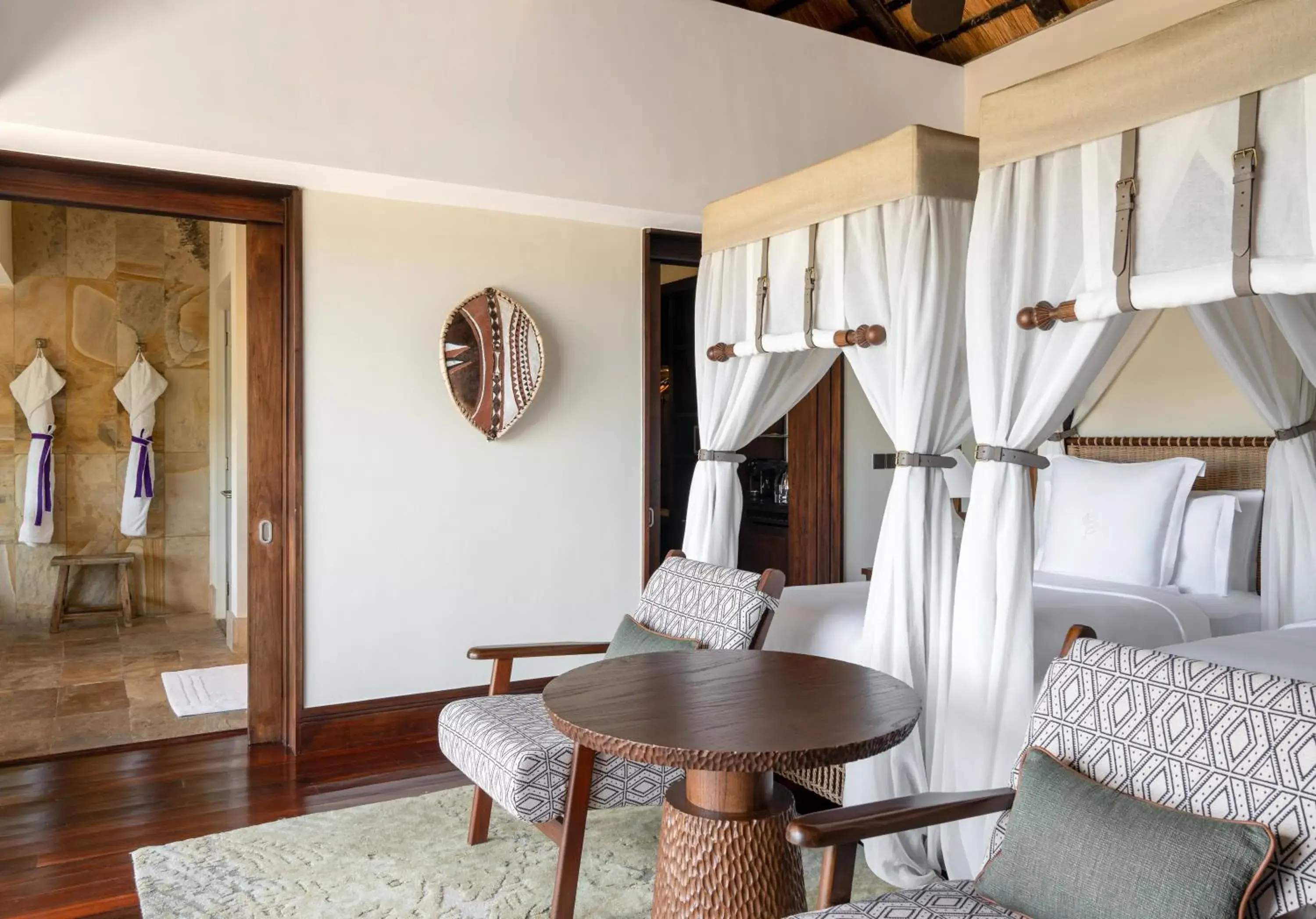 Horizon Room Water Hole View Two Twin Beds - single occupancy in Four Seasons Safari Lodge Serengeti Horizon Room Water Hole View Two Twin Beds - single occupancy in Four Seasons Safari Lodge Serengeti