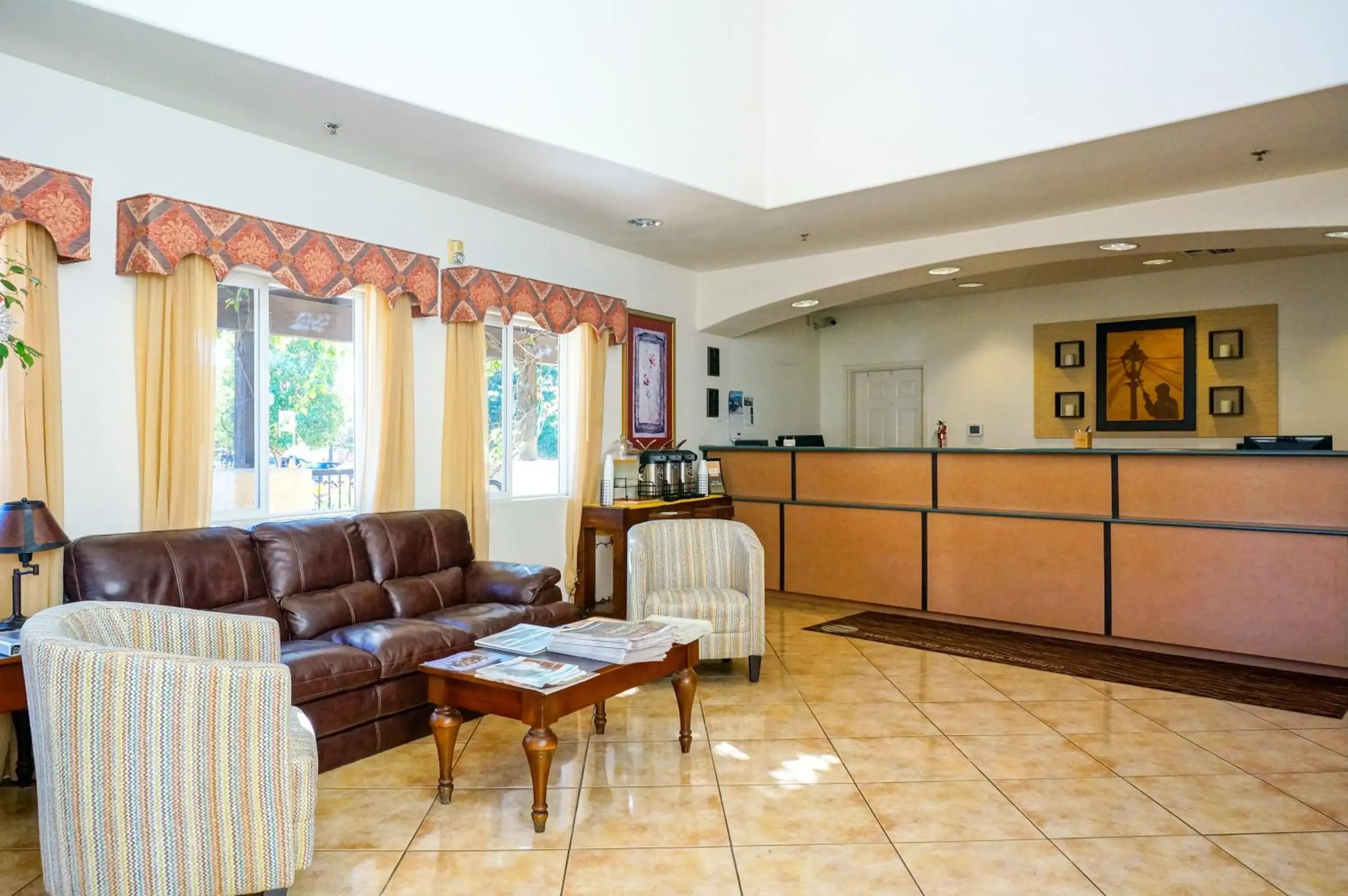Lobby or reception in Lamplighter Inn & Suites Lobby or reception in Lamplighter Inn & Suites