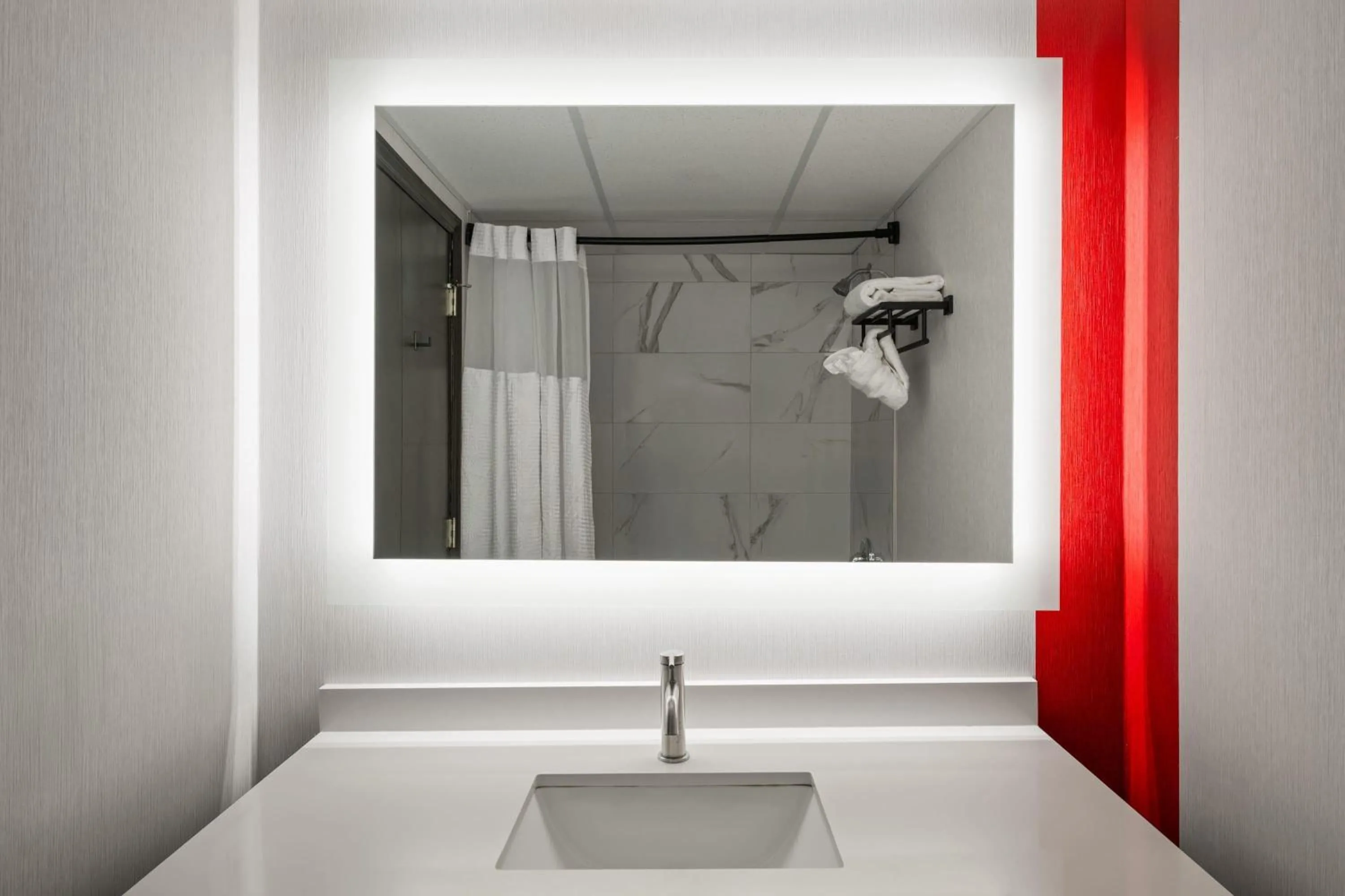 Bathroom in Ramada Plaza by Wyndham Regina Downtown