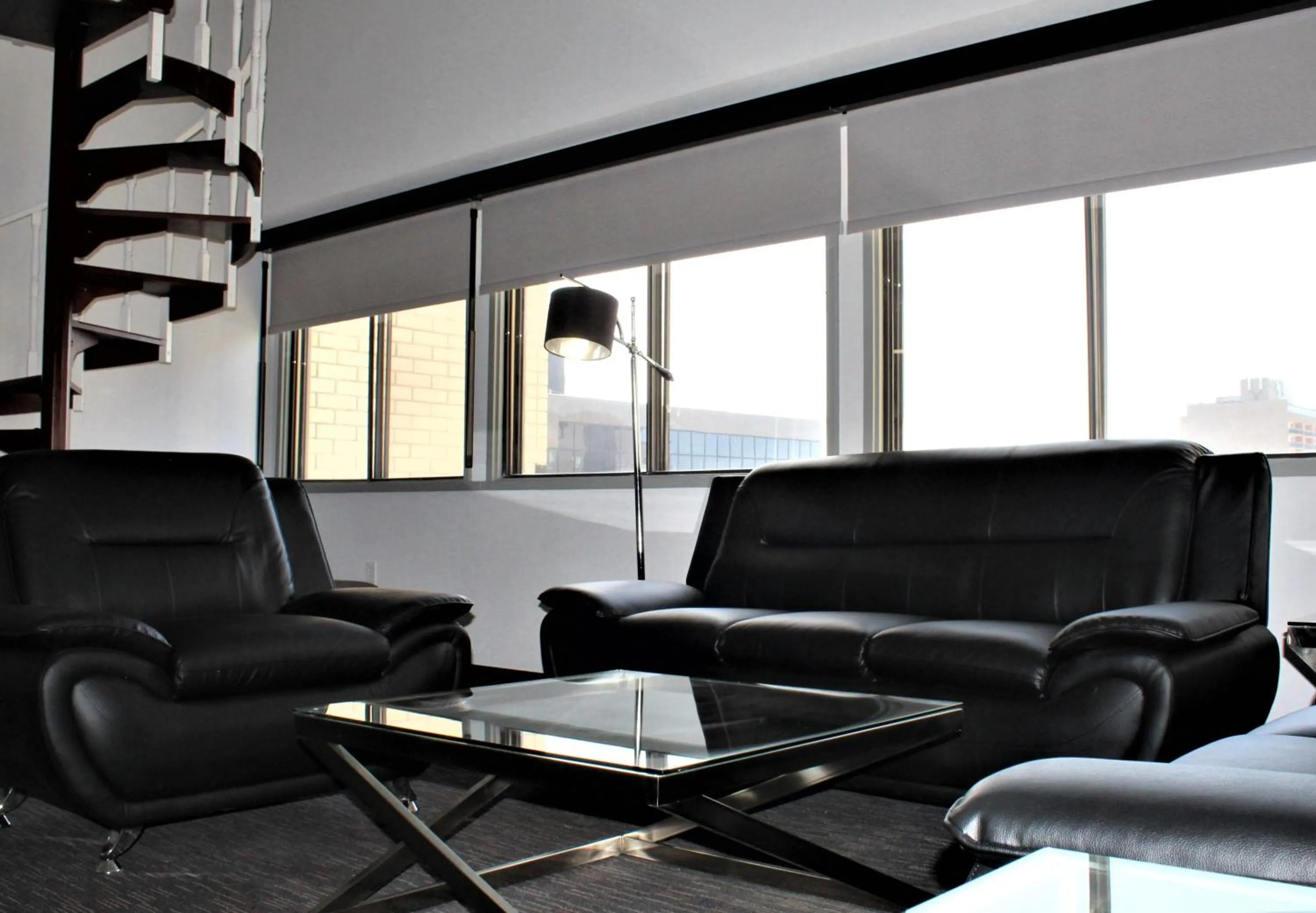 Living room in Ramada Plaza by Wyndham Regina Downtown