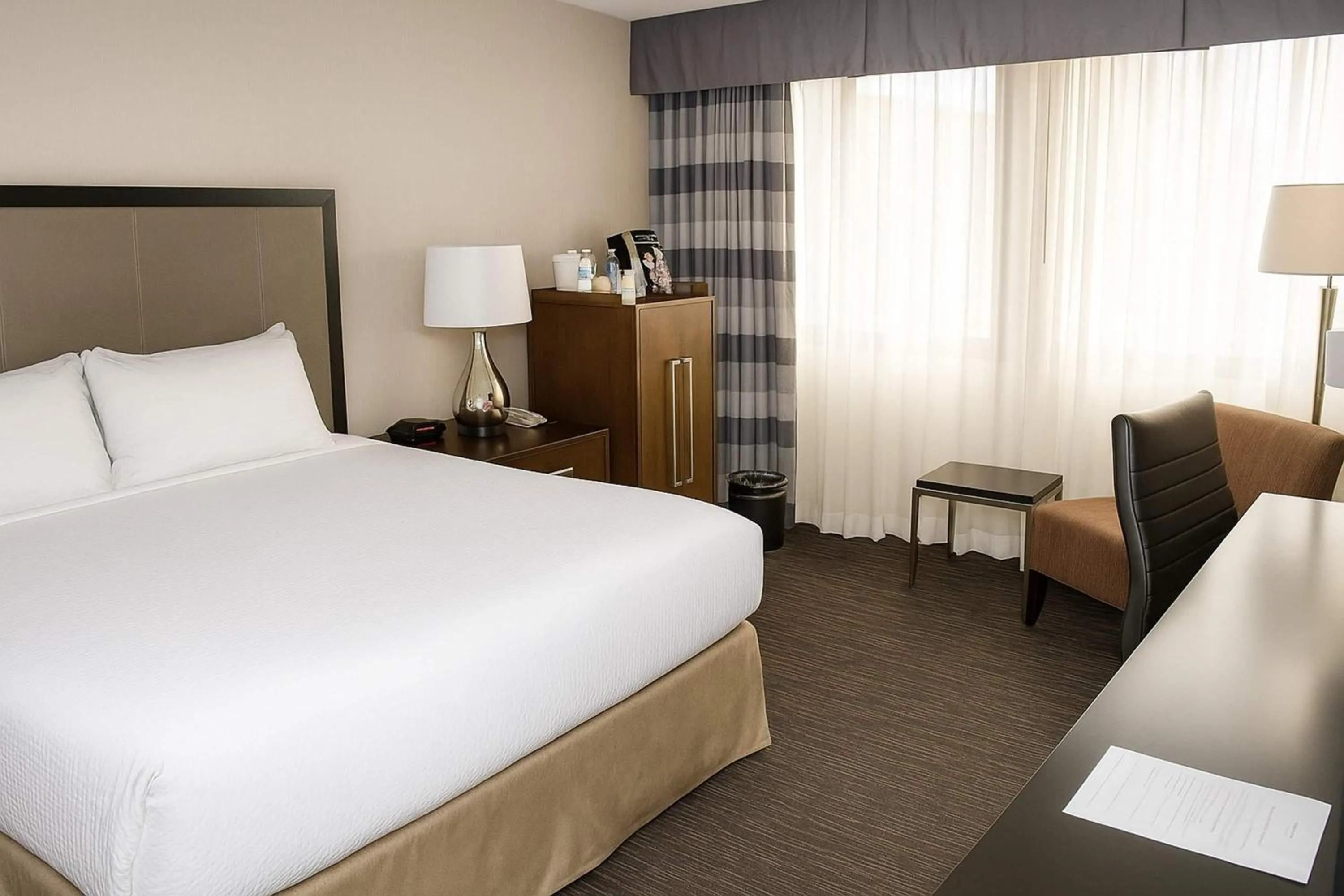 Photo of the whole room, Bed in Ramada Plaza by Wyndham Regina Downtown