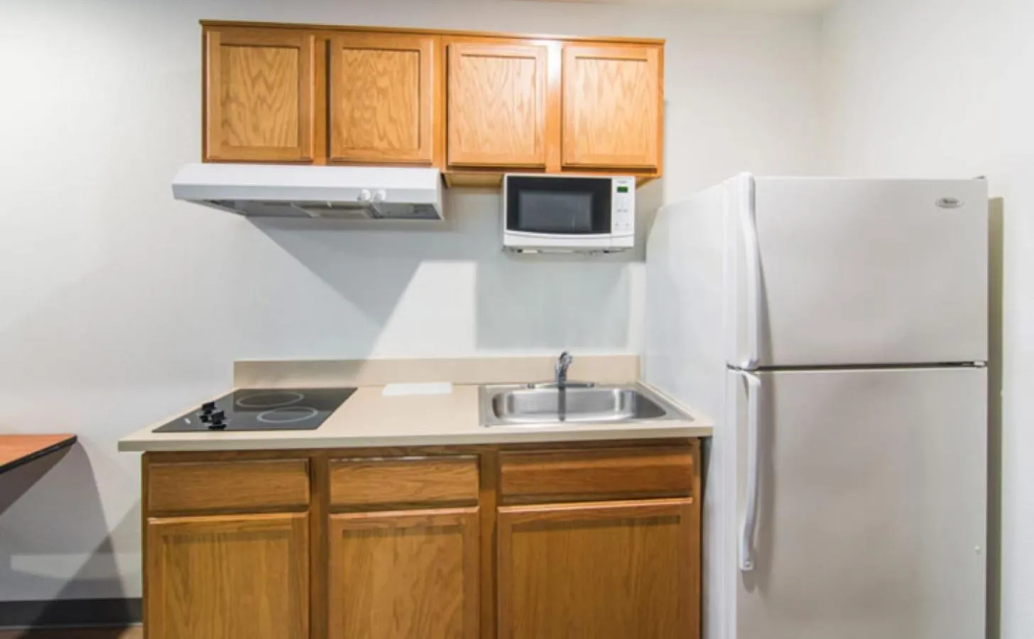 Kitchen or kitchenette in WoodSpring Suites Port Orange - Daytona Beach