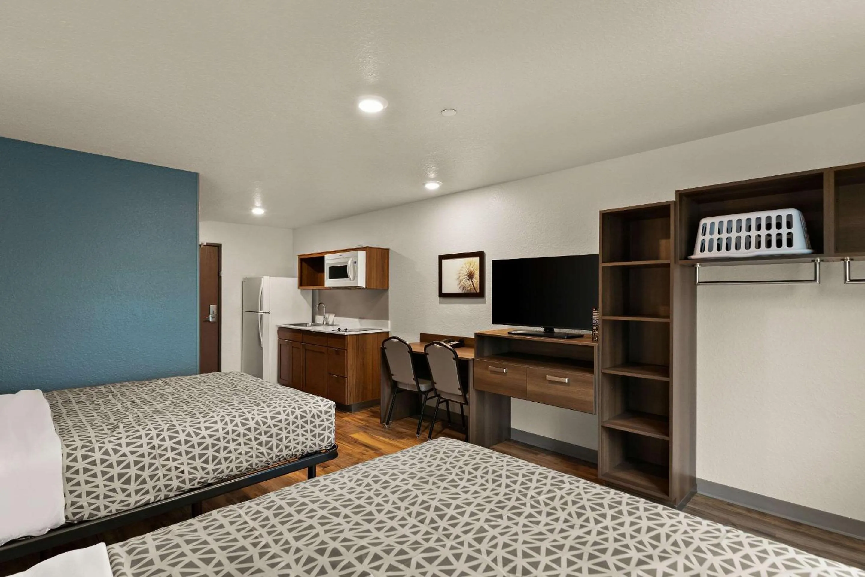 Bedroom, Bed in WoodSpring Suites Port Orange - Daytona Beach