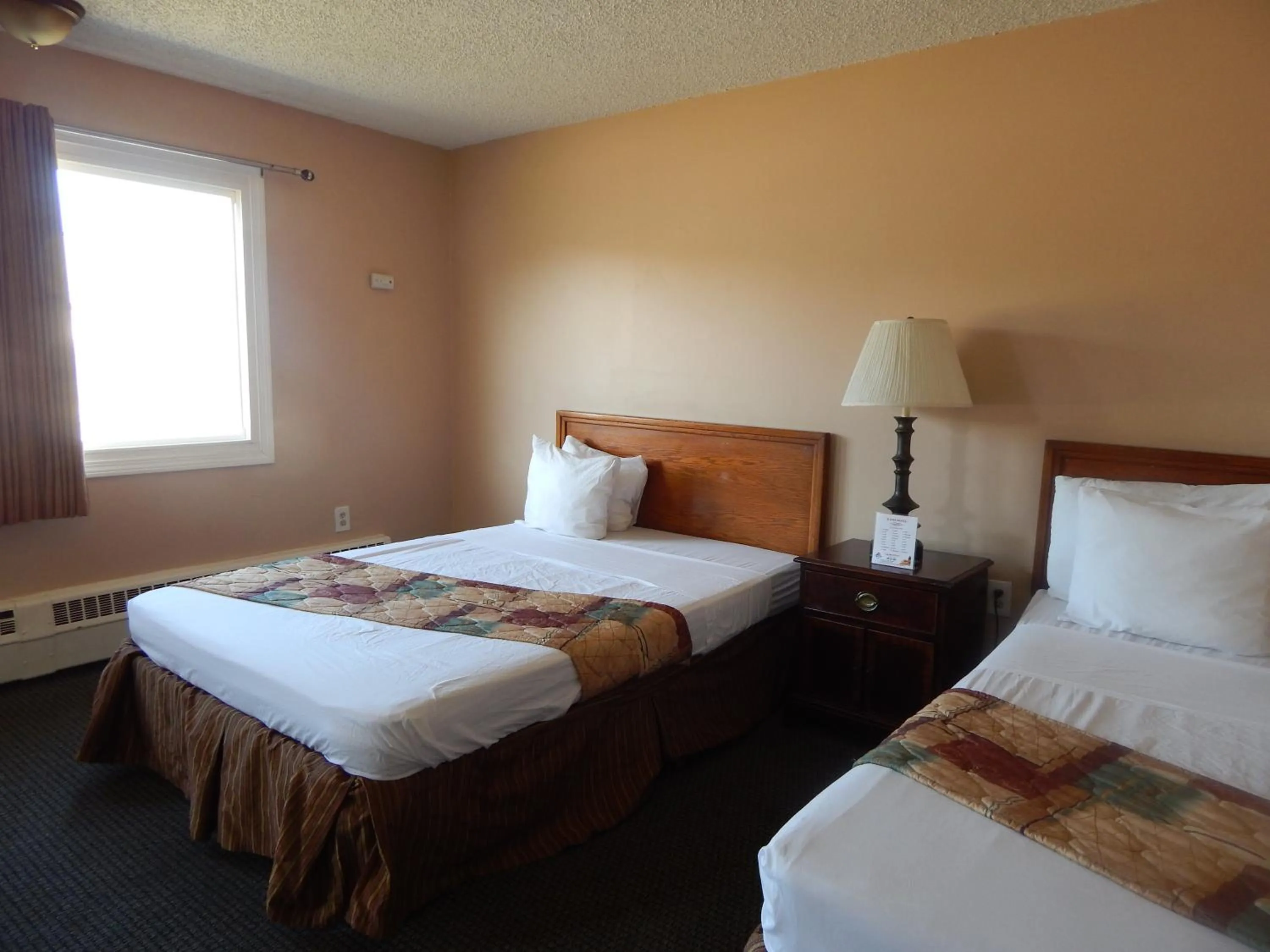 Day, Bed in Capri Motel