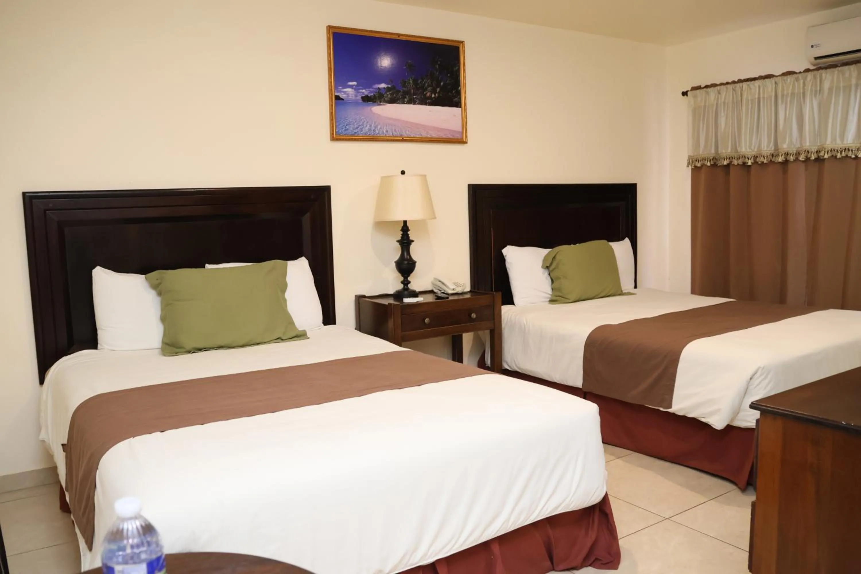 Bed in Hotel Partenon Beach