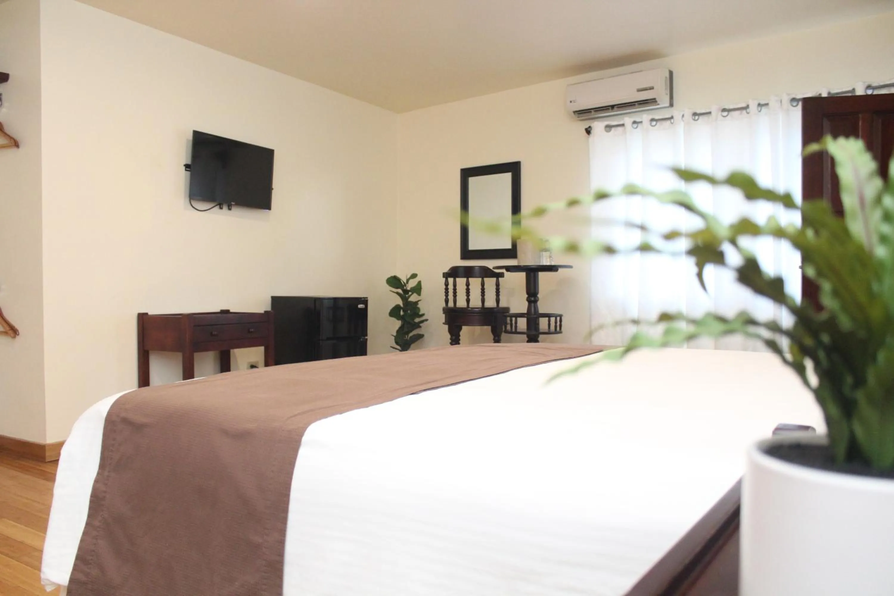 Seating area, Bed in Hotel Partenon Beach