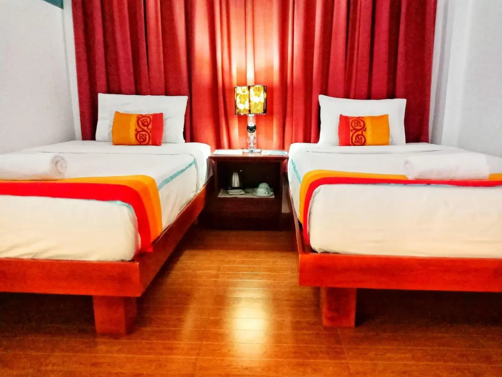 Bed in Discover Boracay Hotel