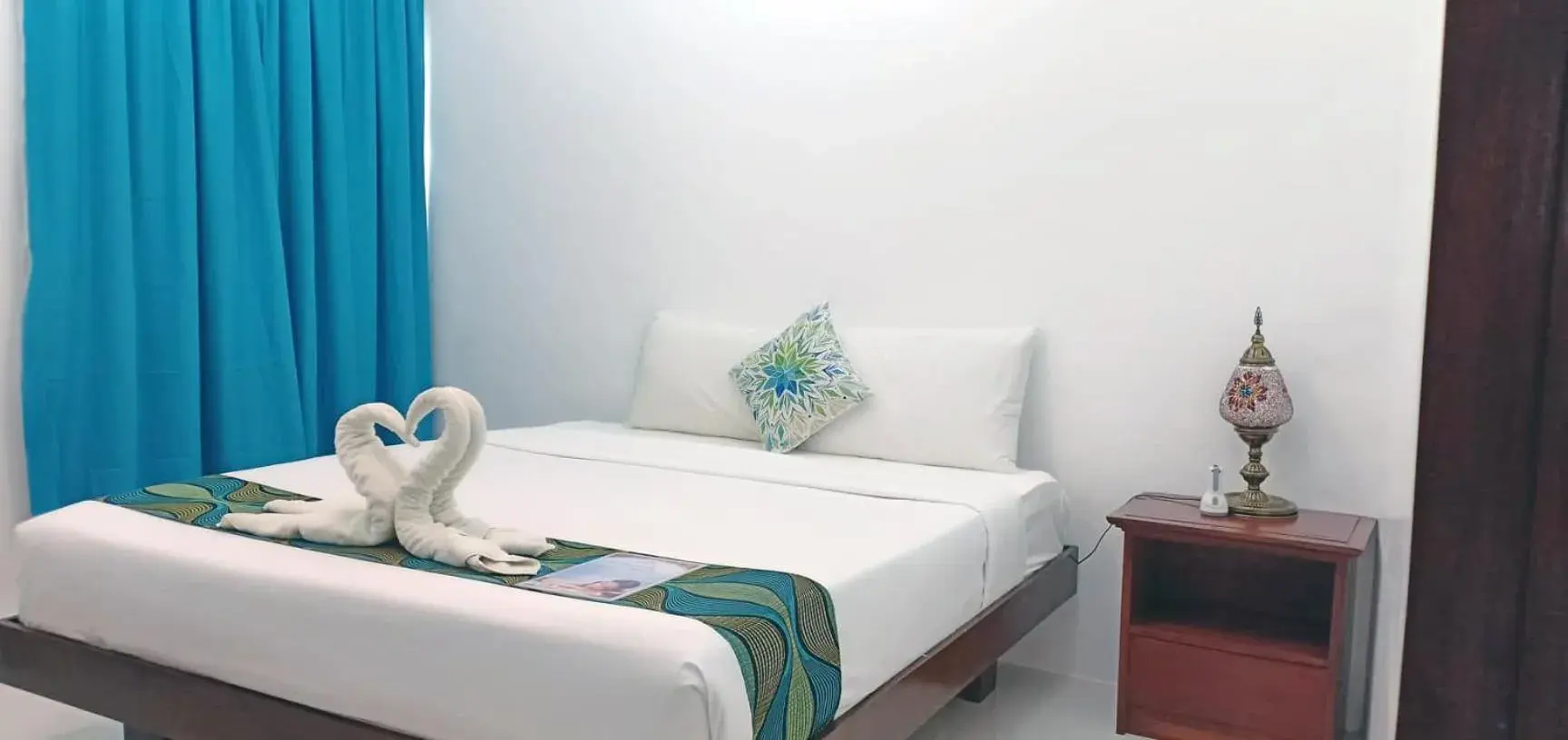 Bed in Discover Boracay Hotel