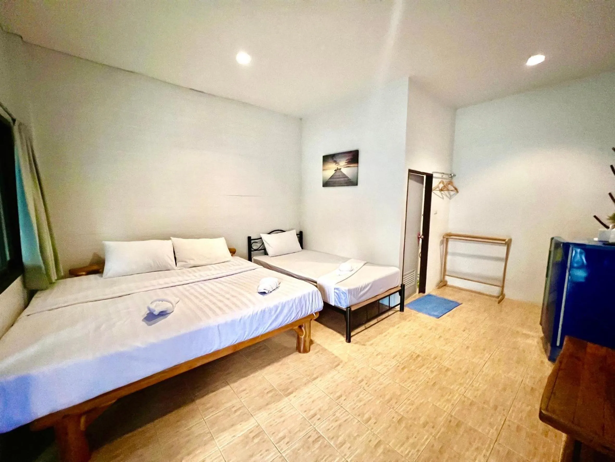 Bed in PHUPA BEACH Resort